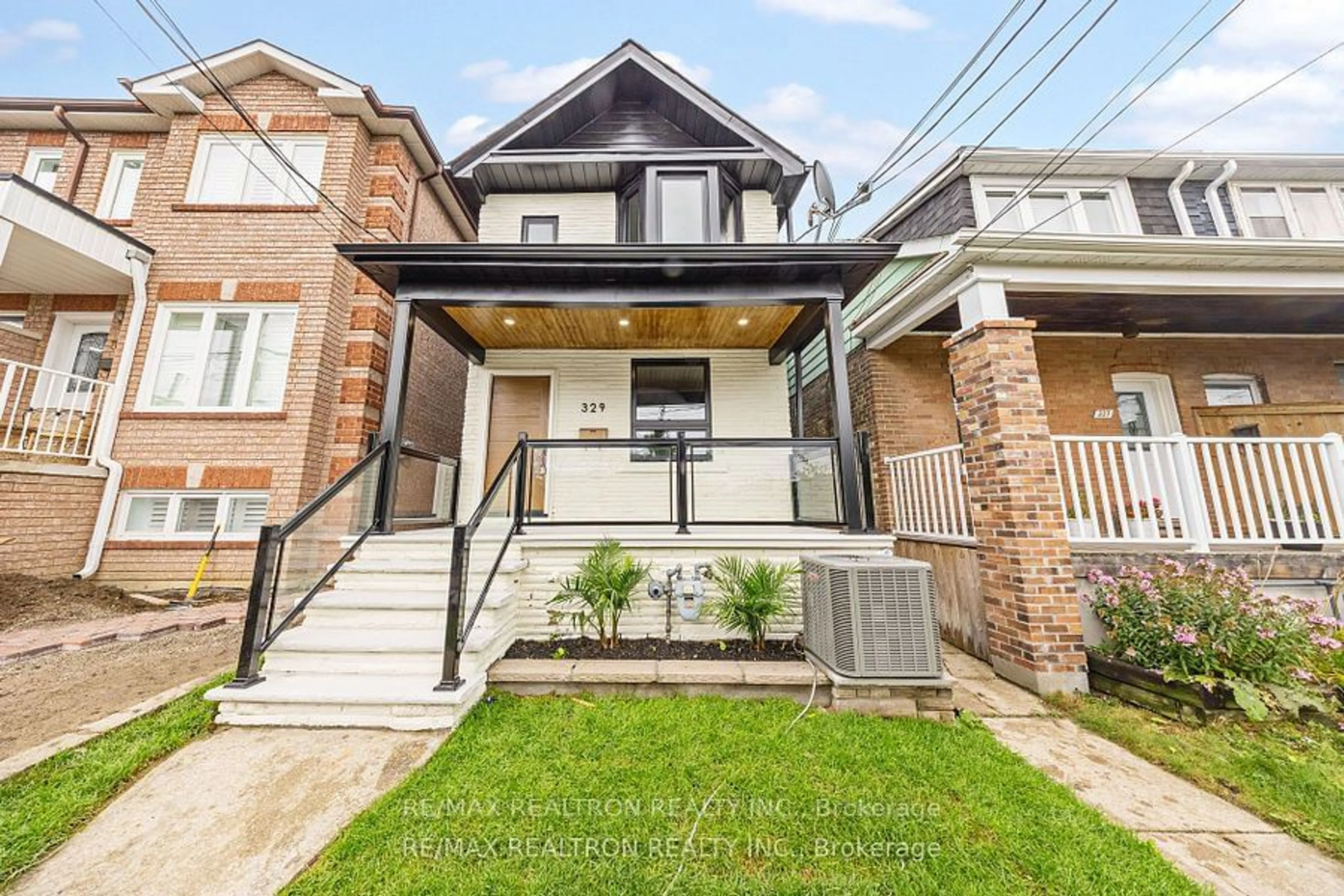 Frontside or backside of a home, cottage for 329 Boon Ave, Toronto Ontario M6E 4A4