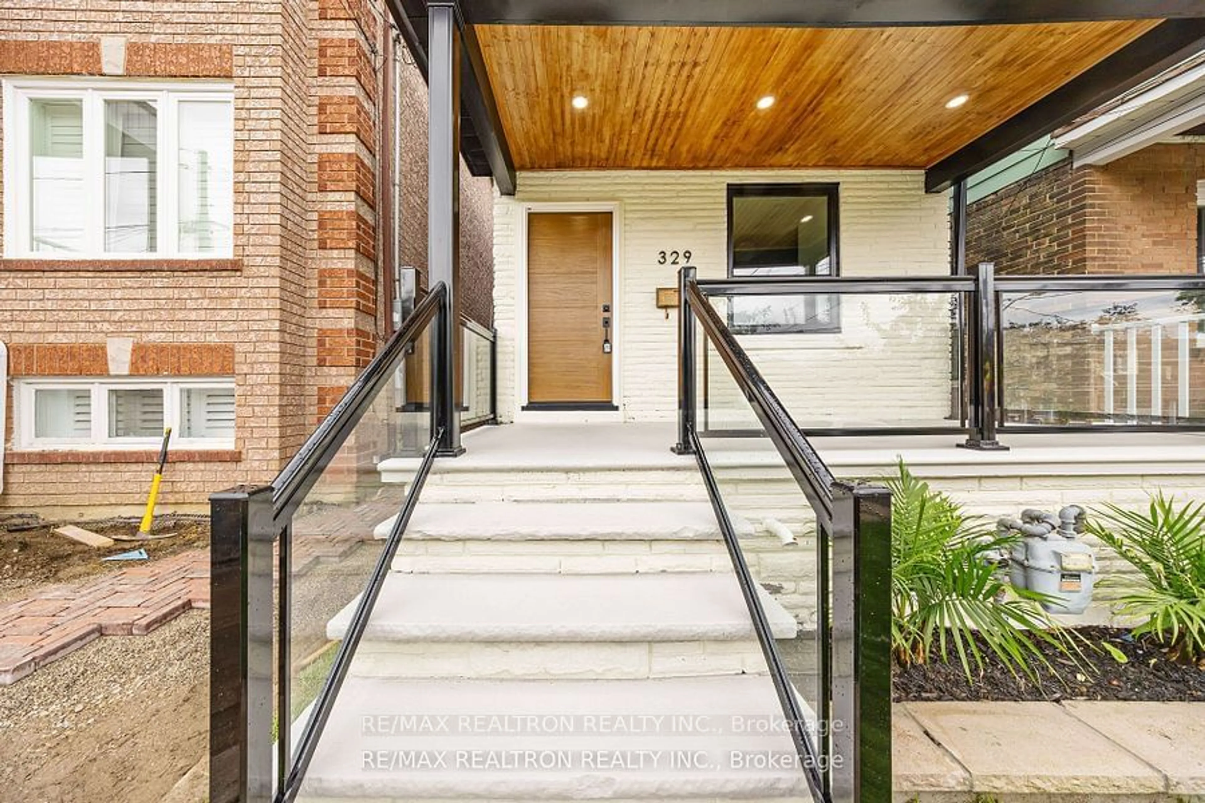 Indoor foyer, wood floors for 329 Boon Ave, Toronto Ontario M6E 4A4