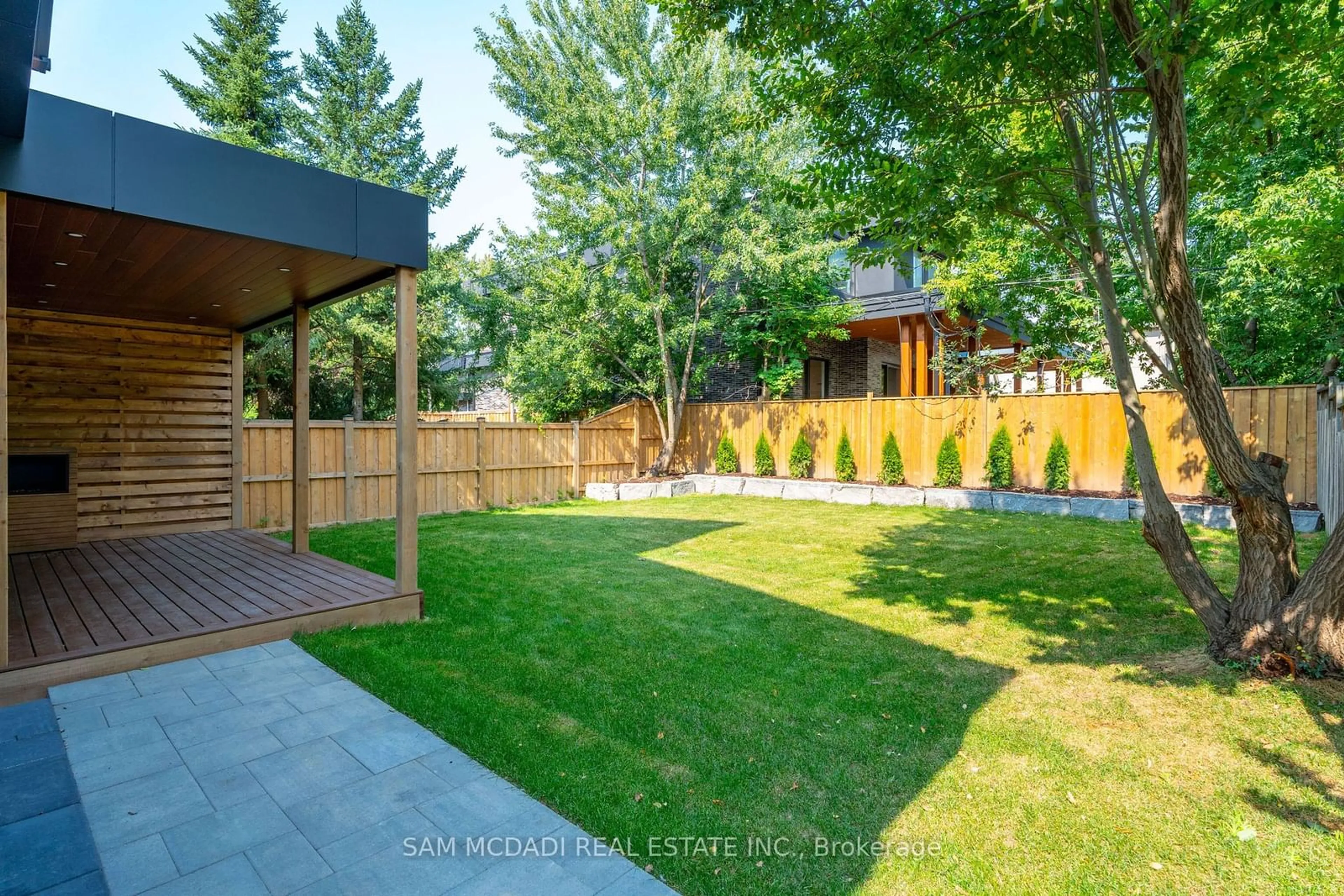 Patio, the fenced backyard for 32 Swan Ave, Toronto Ontario M9B 1V4