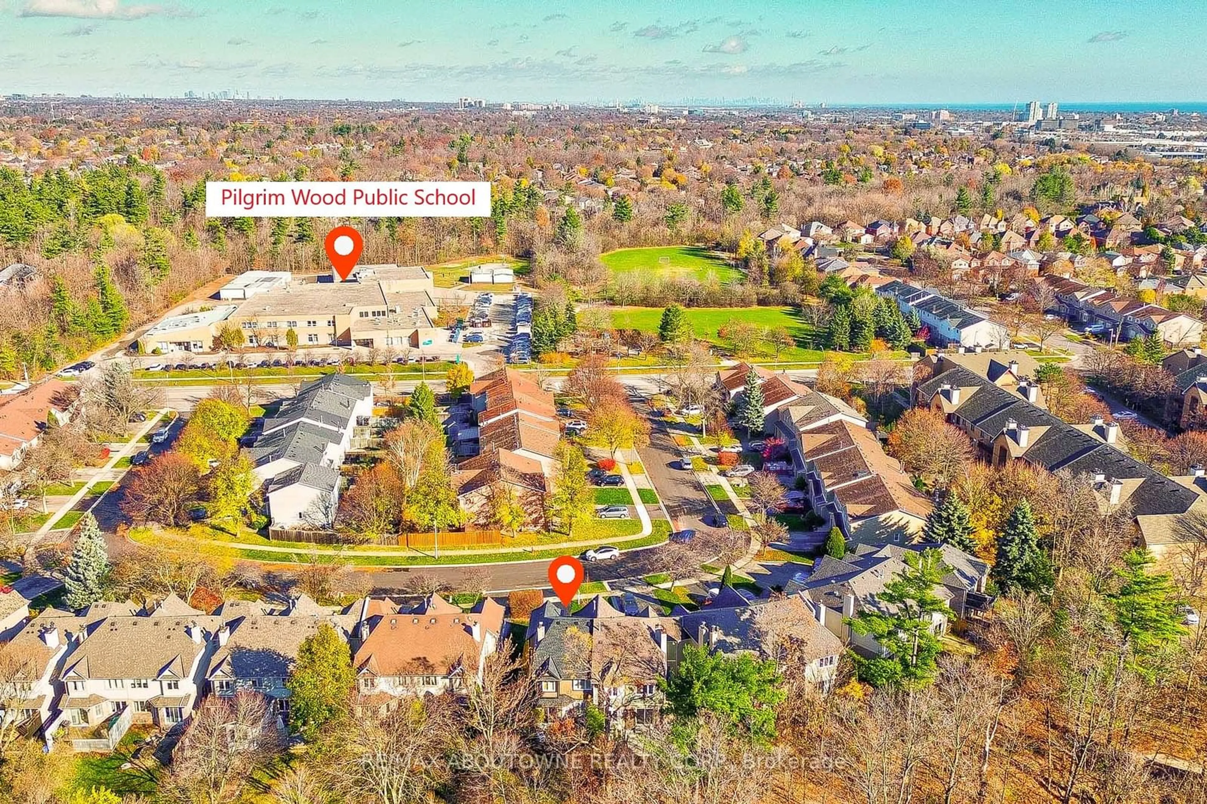 A pic from exterior of the house or condo, the fenced backyard for 1246 Cottonwood Cres, Oakville Ontario L6M 2W6