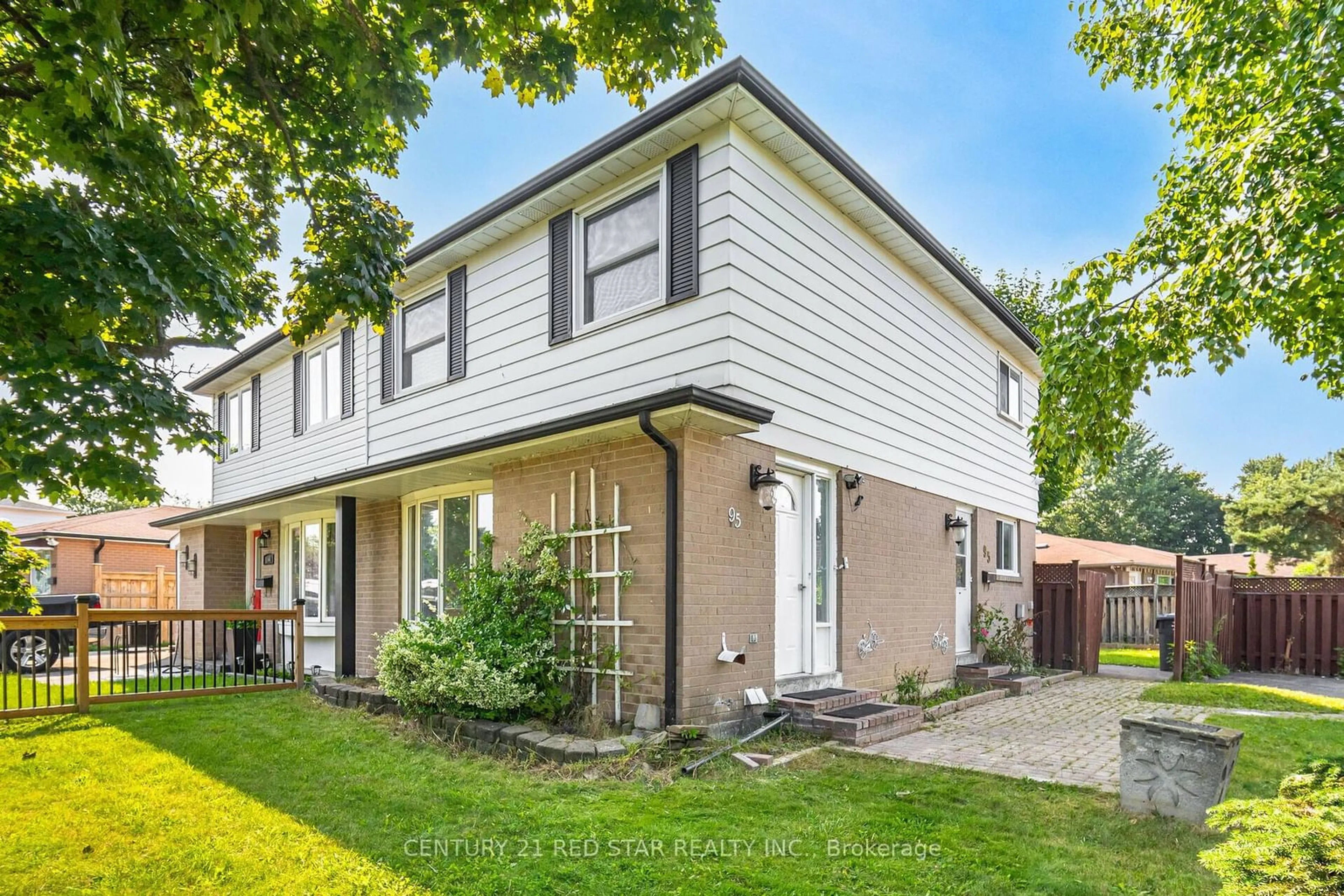 A pic from exterior of the house or condo, the fenced backyard for 95 Glenmore Cres, Brampton Ontario L6S 1H9