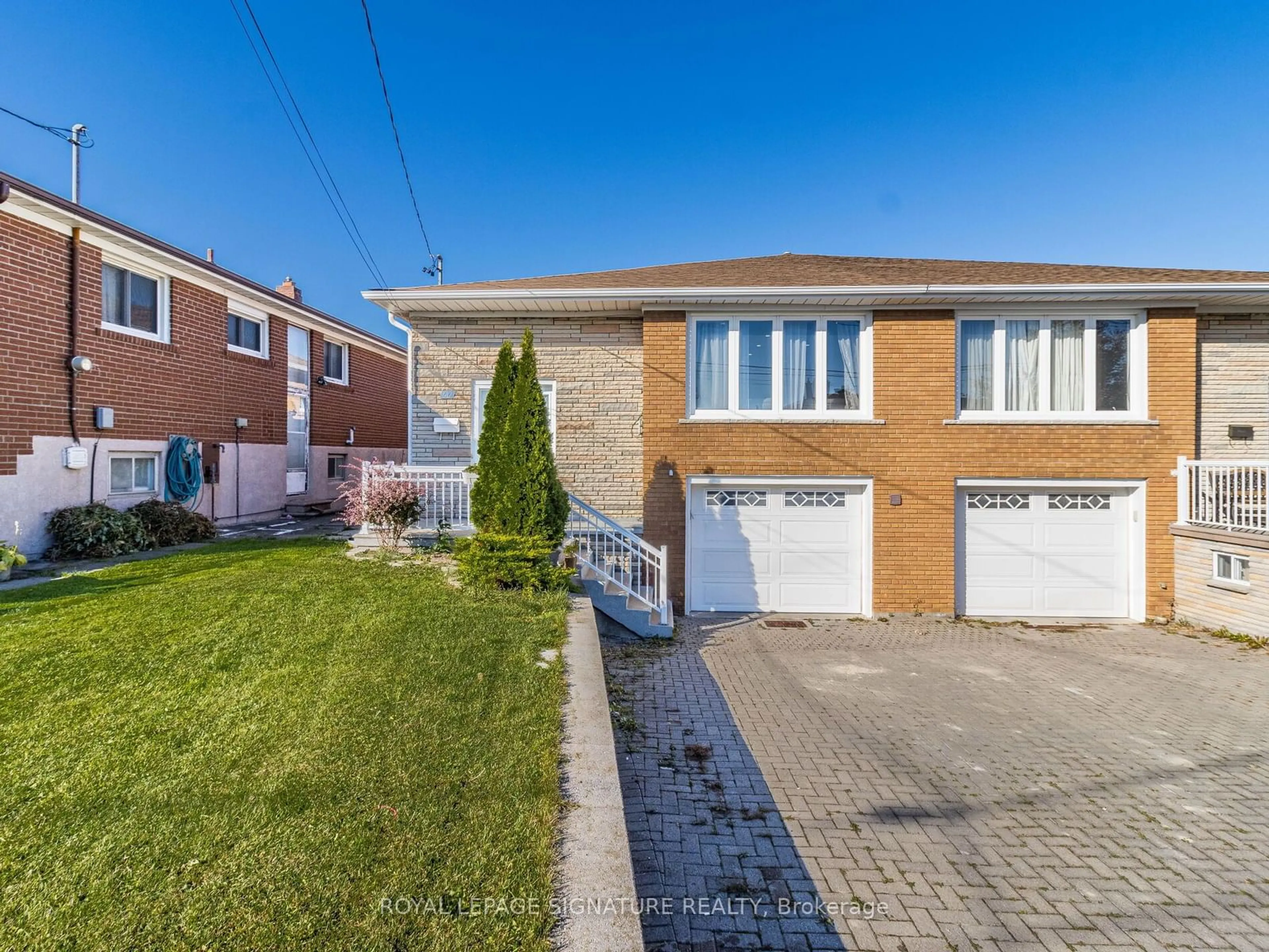 Frontside or backside of a home, the street view for 66 Arleta Ave, Toronto Ontario M3L 2E7