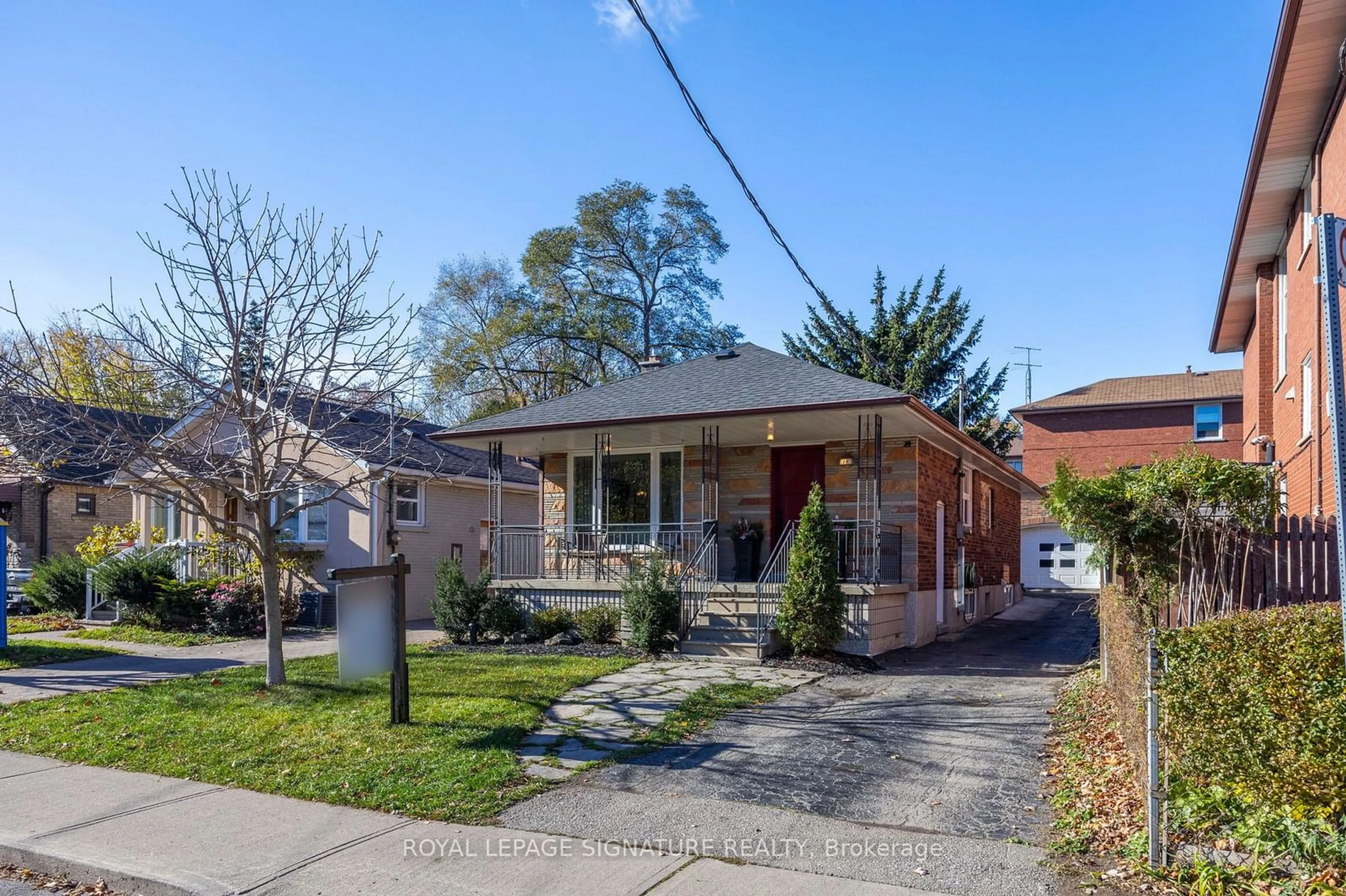 Frontside or backside of a home, the street view for 16 Stanley Ave, Toronto Ontario M8V 1N1