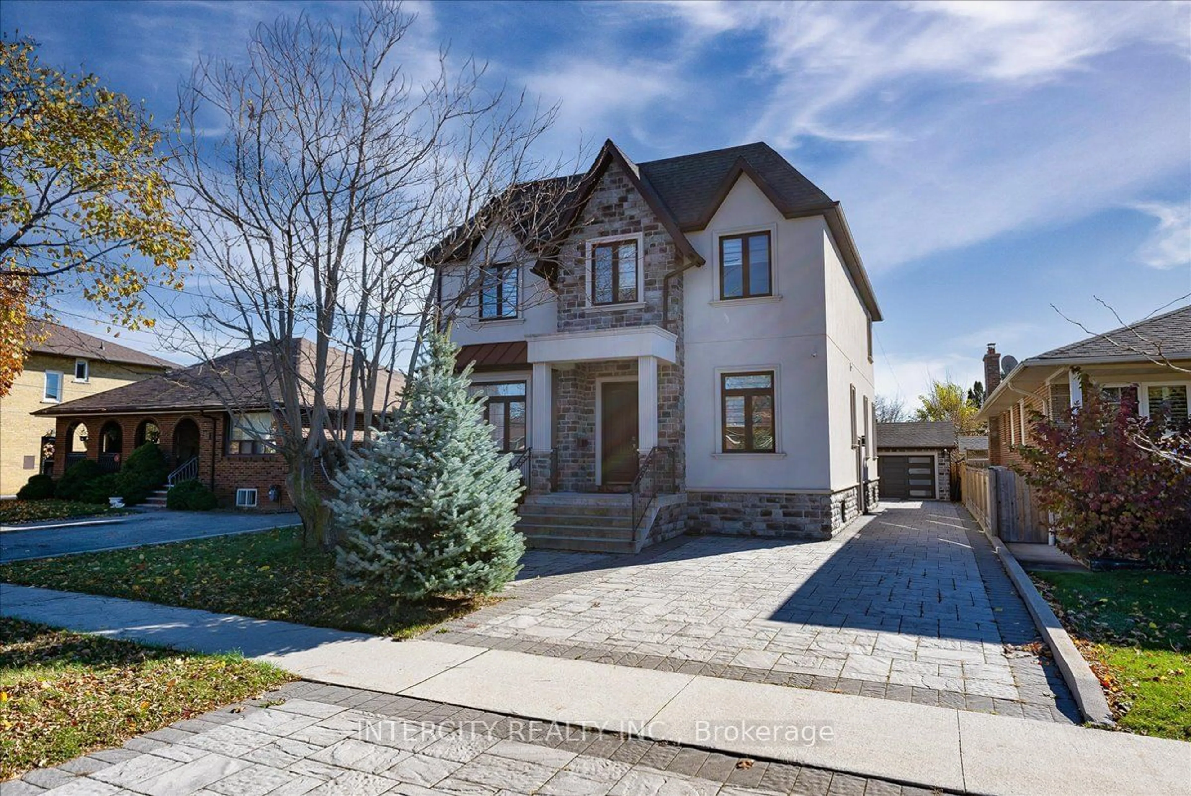 Frontside or backside of a home, the street view for 67 Mcadam Ave, Toronto Ontario M6A 1S6