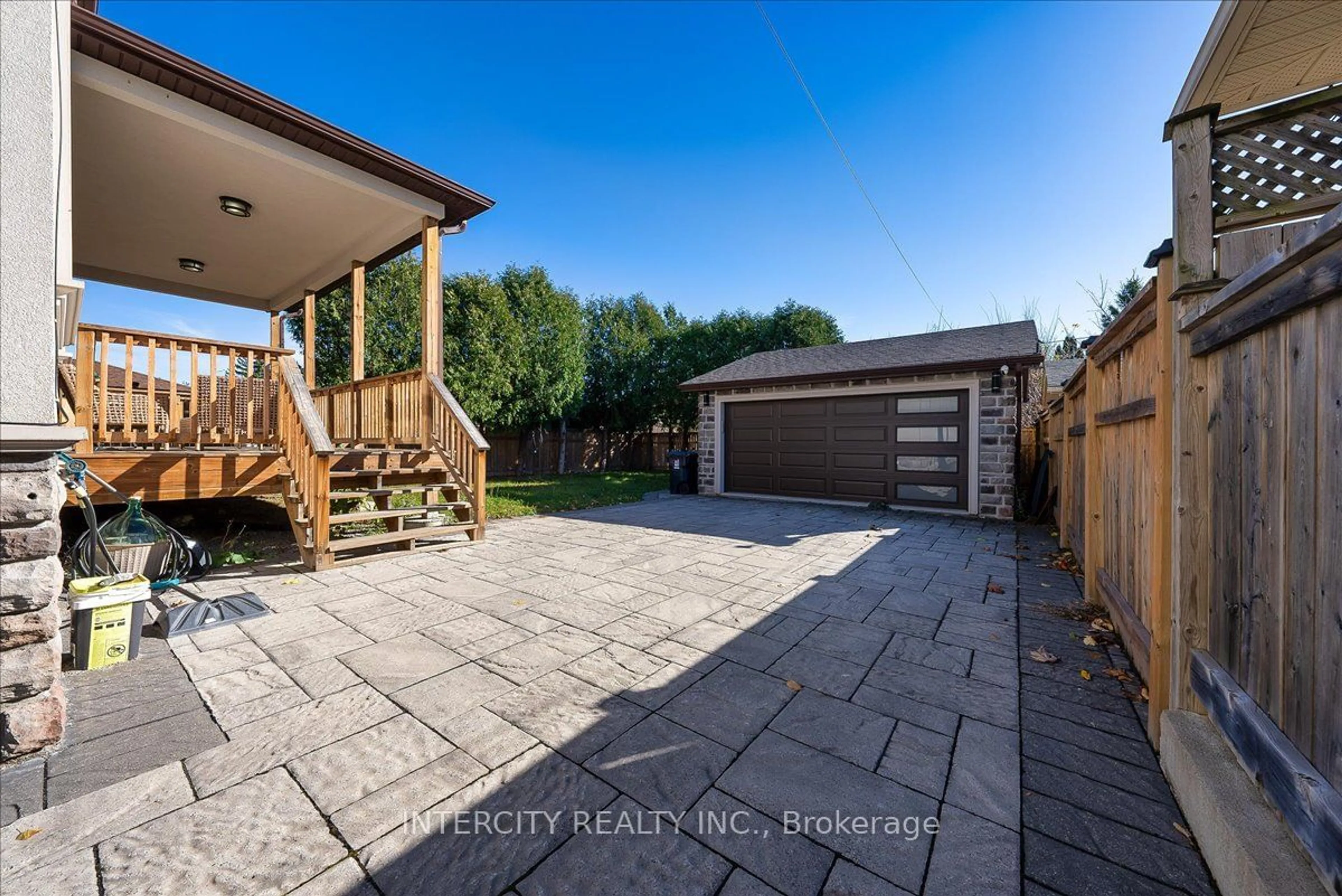 Patio, the fenced backyard for 67 Mcadam Ave, Toronto Ontario M6A 1S6