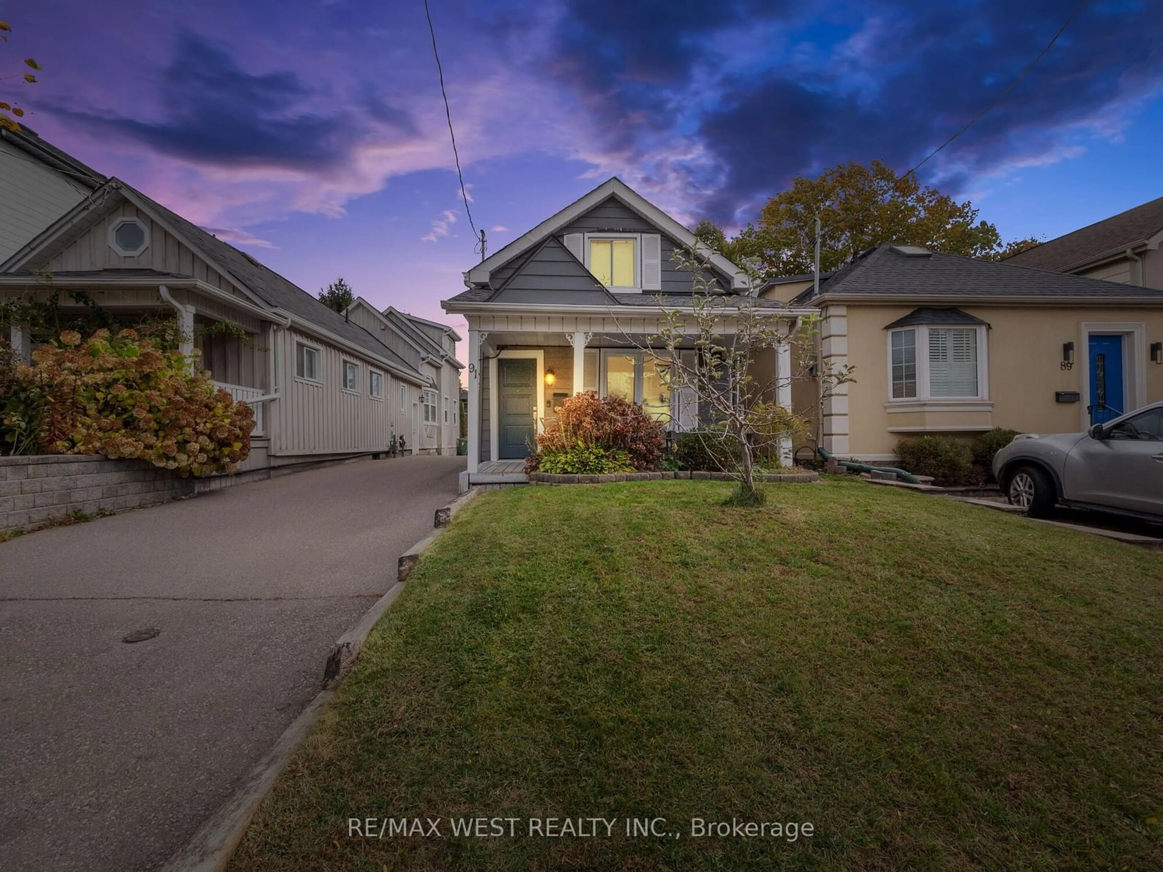 Frontside or backside of a home, the street view for 91 Fortieth St, Toronto Ontario M8W 3N2