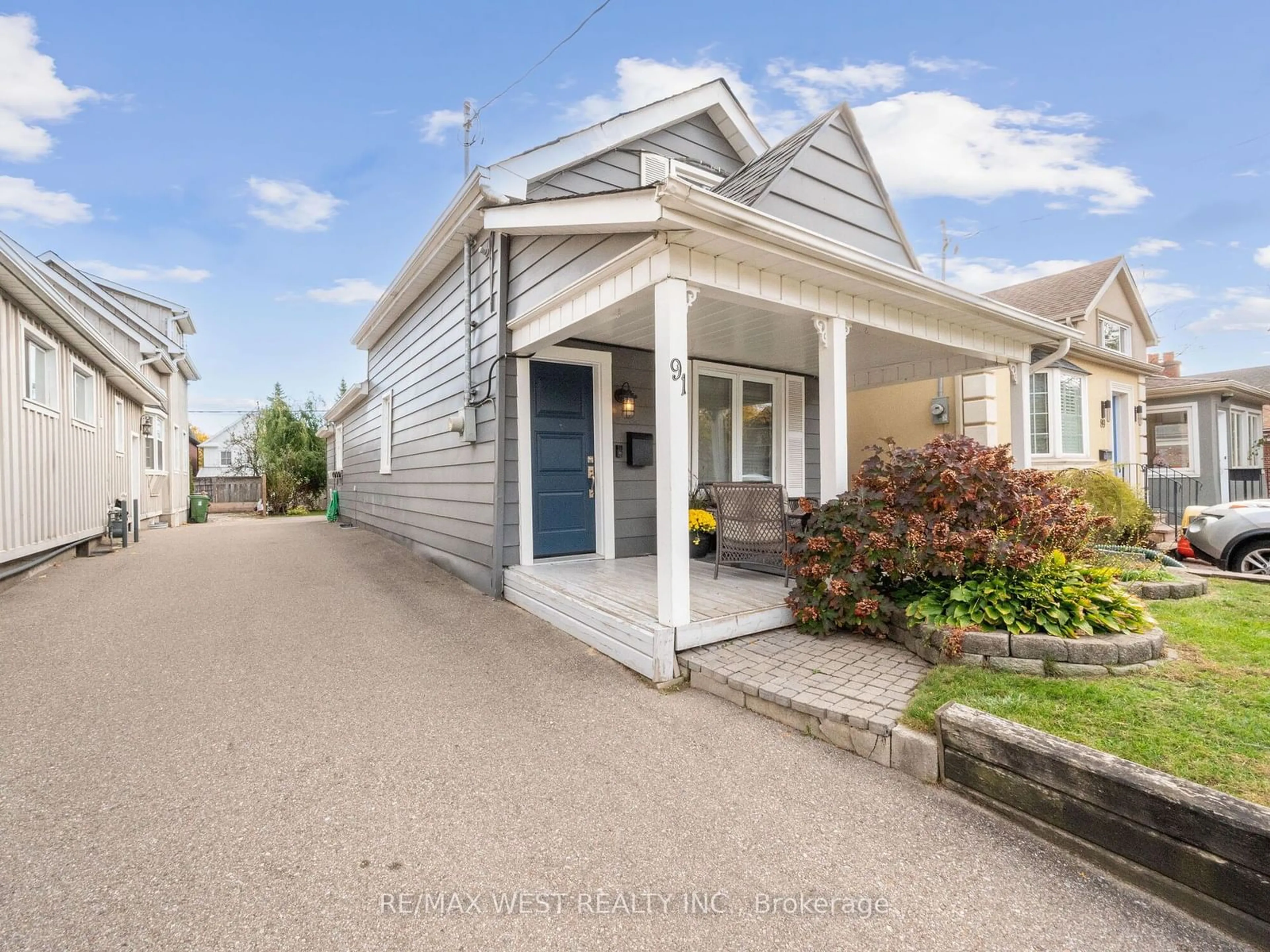 Frontside or backside of a home, the street view for 91 Fortieth St, Toronto Ontario M8W 3N2