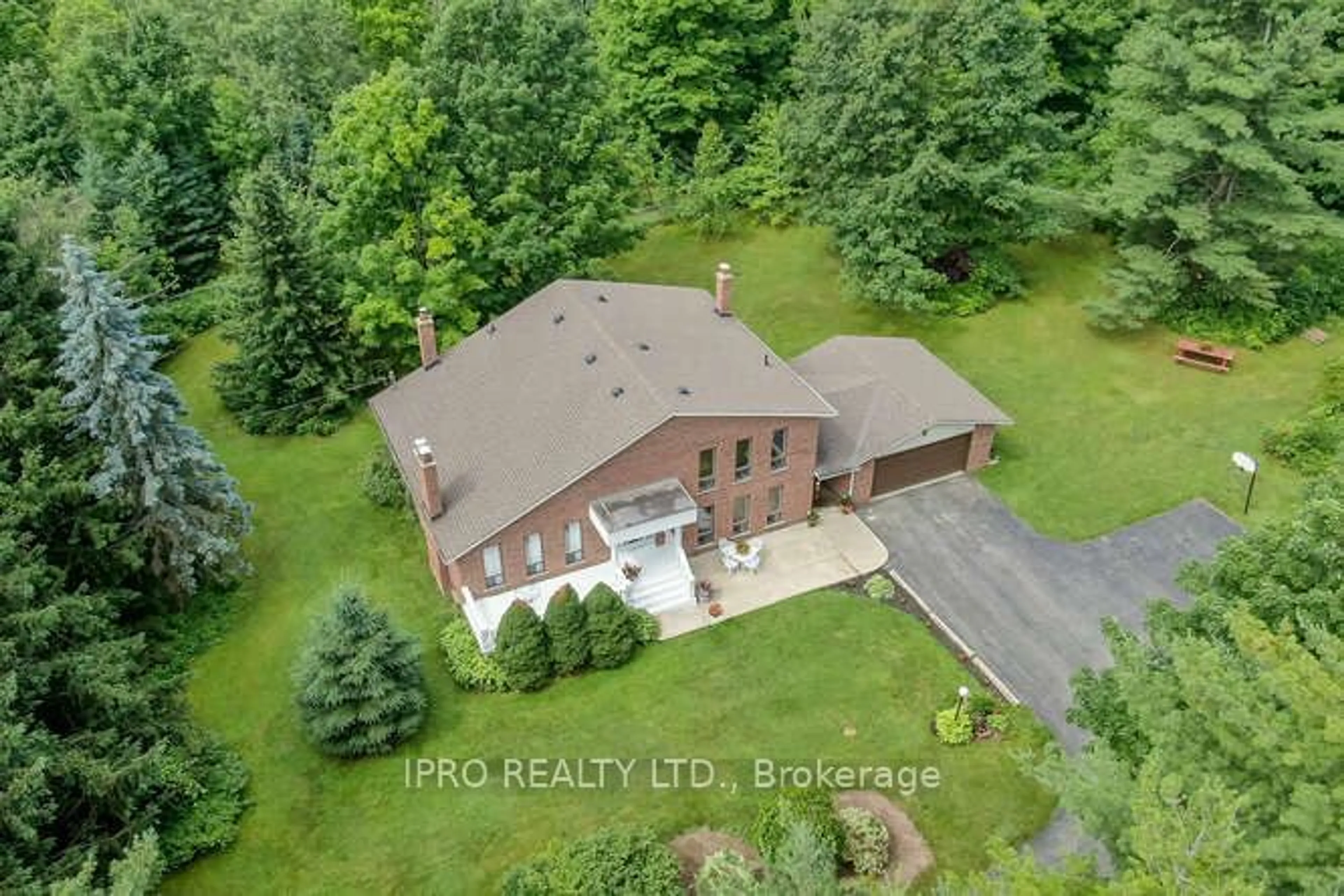 Frontside or backside of a home, the front or back of building for 7899 15 Side Road, Halton Hills Ontario L9T 2X7