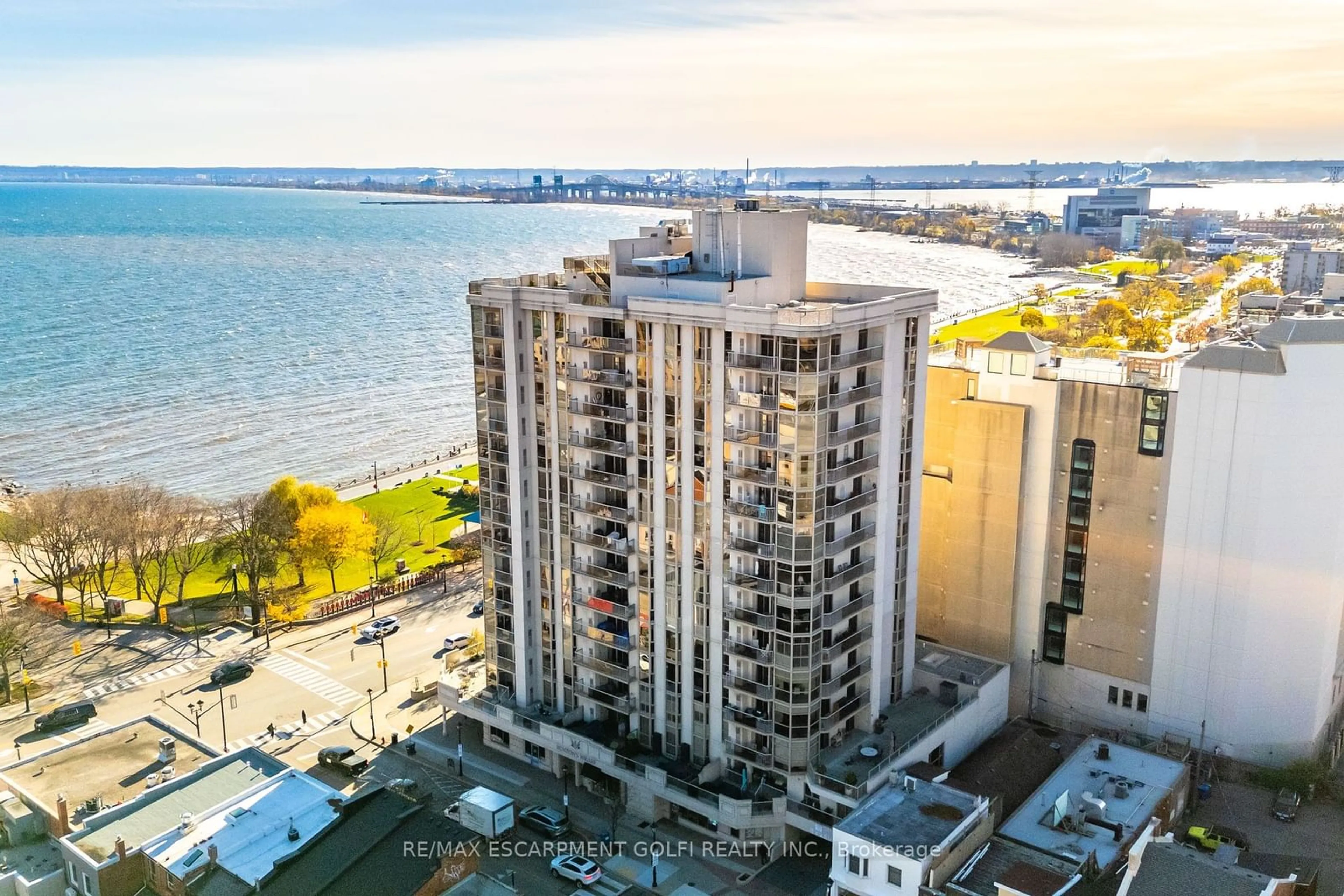 A pic from exterior of the house or condo, the view of city buildings for 1477 Lakeshore Rd #304, Burlington Ontario L7S 1B5