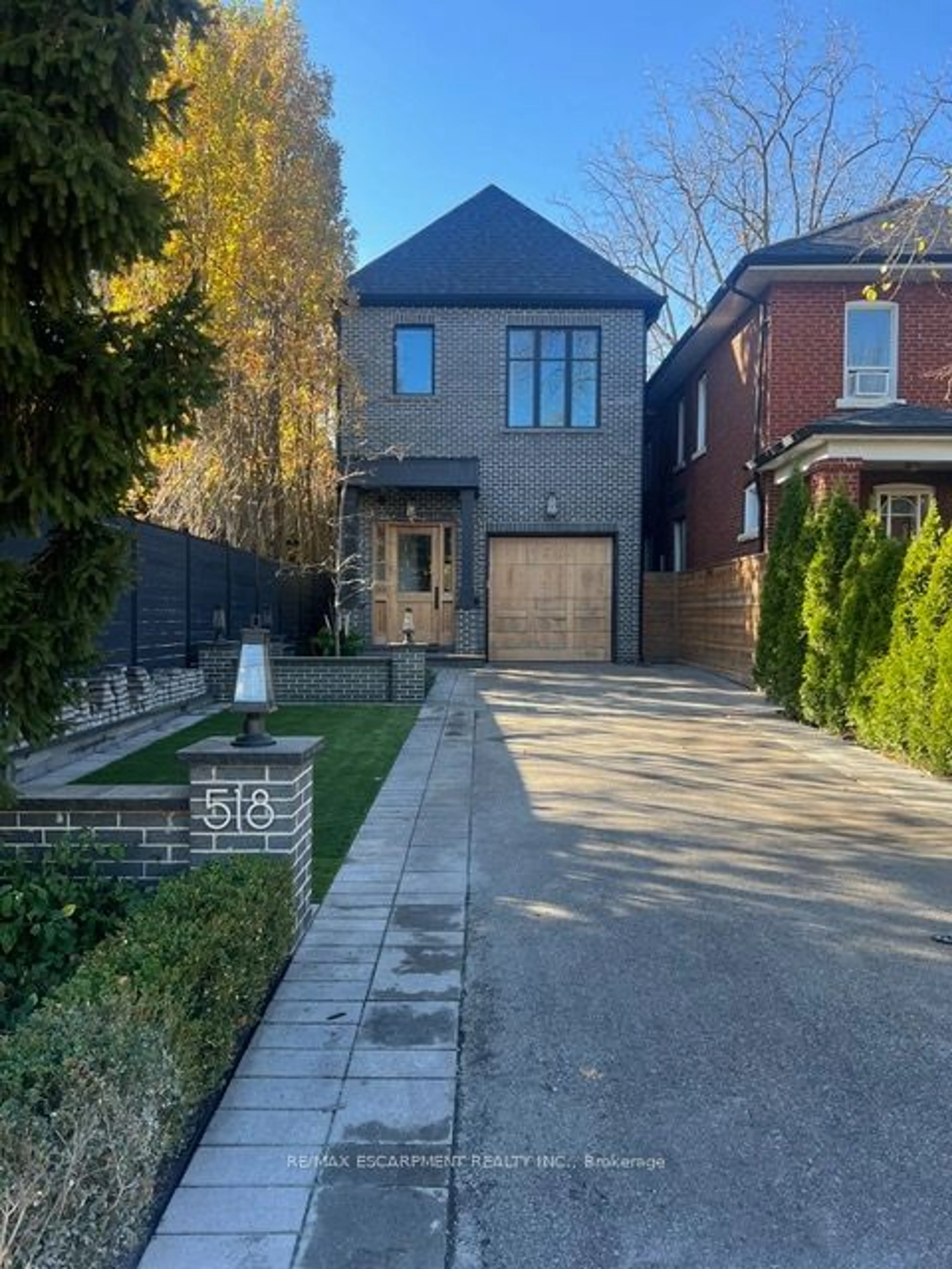 Frontside or backside of a home, the street view for 518 Prince Edward Dr, Toronto Ontario M8X 2M5