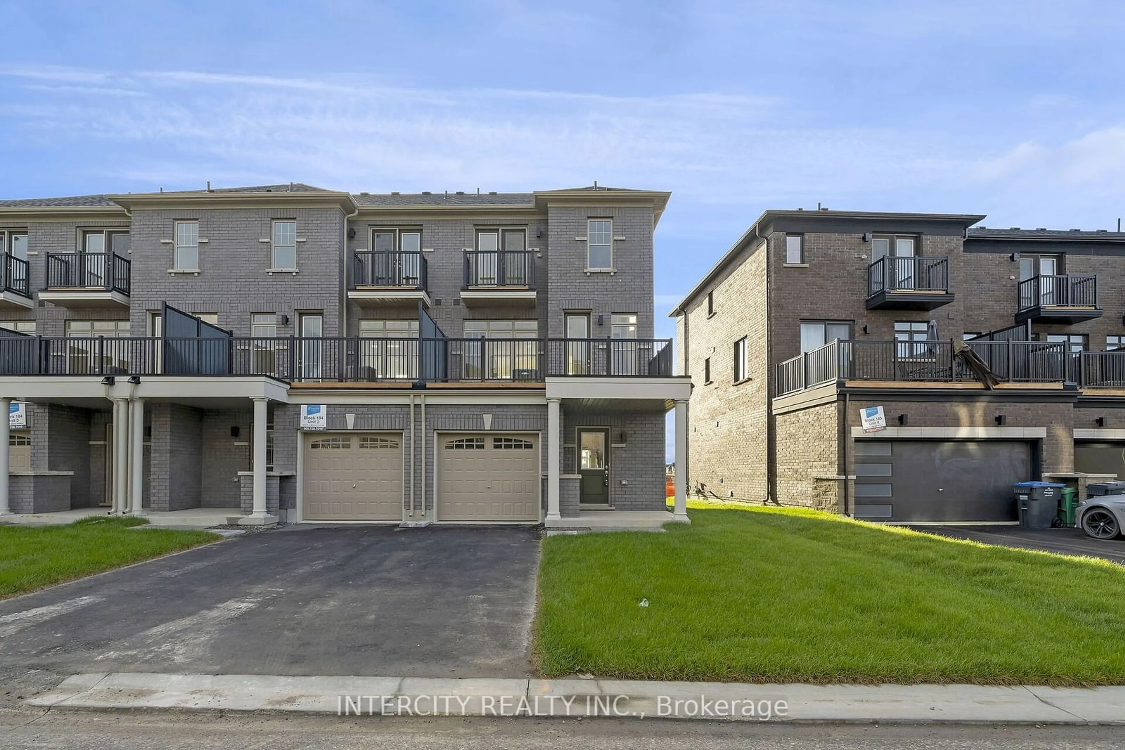 A pic from exterior of the house or condo, the street view for 394 Tim Manley Ave #1, Caledon Ontario L7C 1Z9