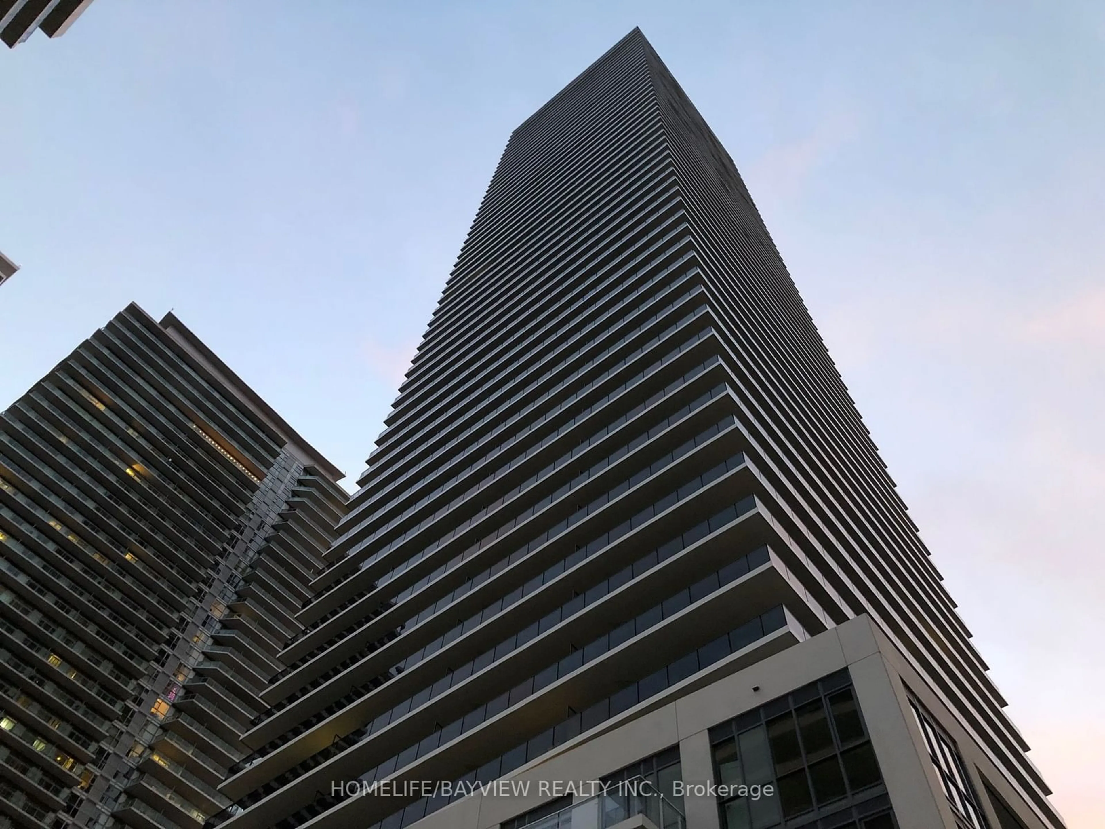 A pic from exterior of the house or condo, the street view for 70 Annie Craig Dr #5001, Toronto Ontario M8V 0G6