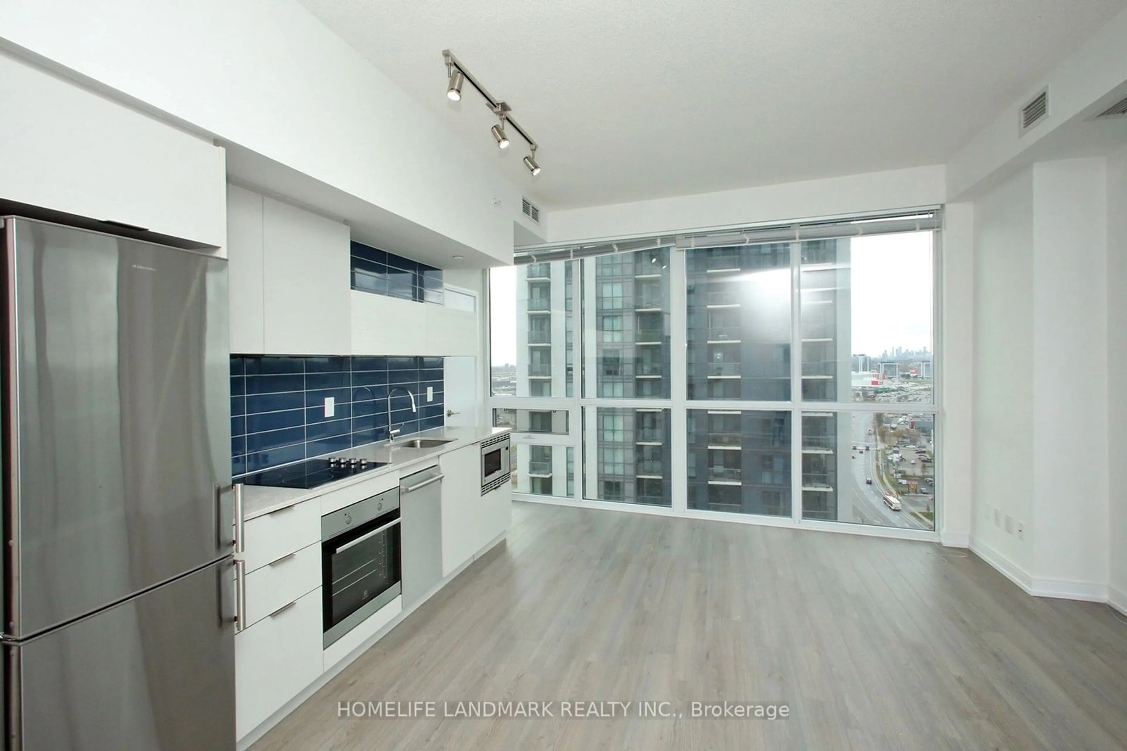 Standard kitchen, wood floors, mountain for 20 Thomas Riley Rd #1802, Toronto Ontario M9B 1B1