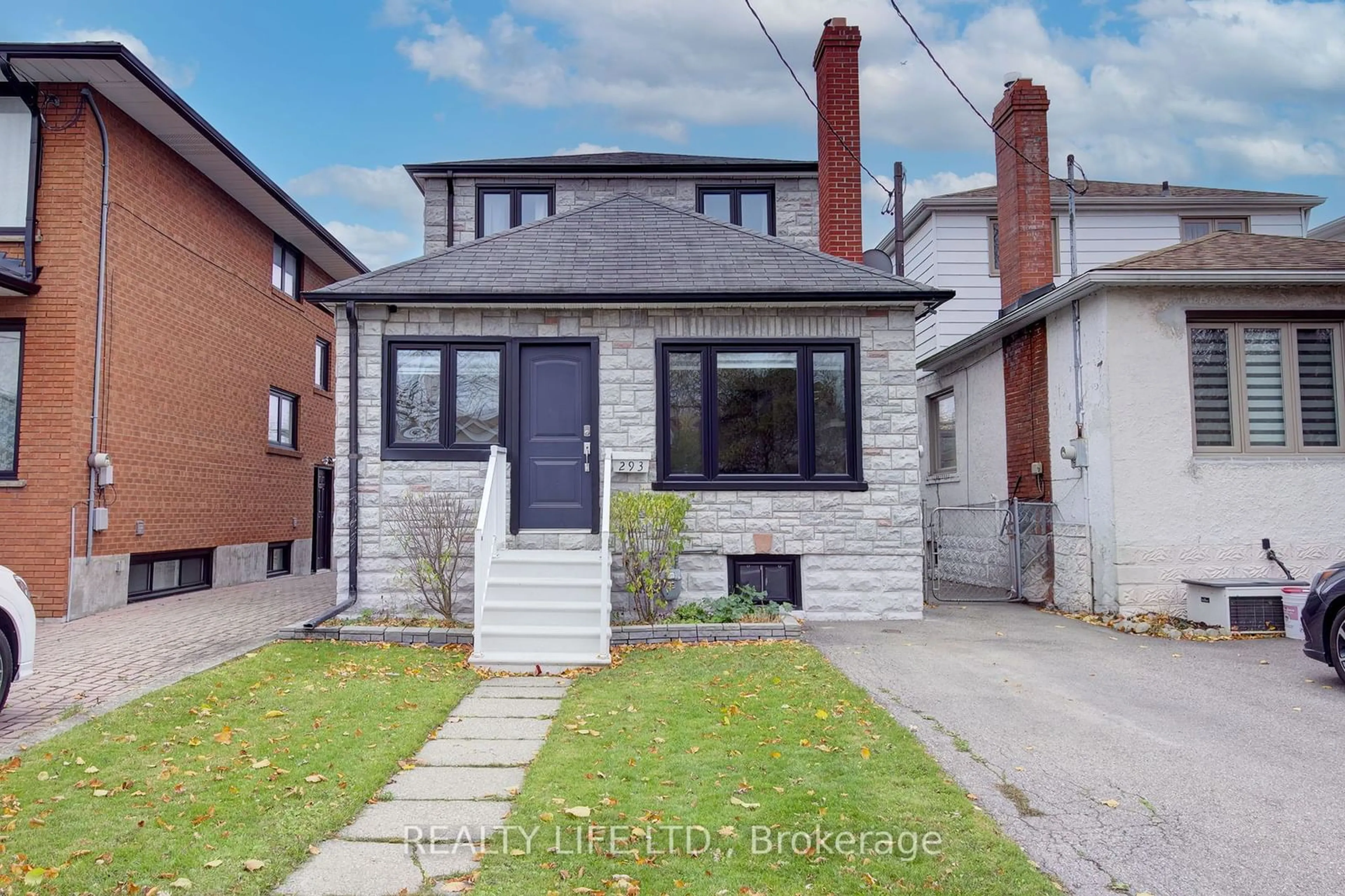 Frontside or backside of a home, the street view for 293 Melrose St, Toronto Ontario M8Z 1G7