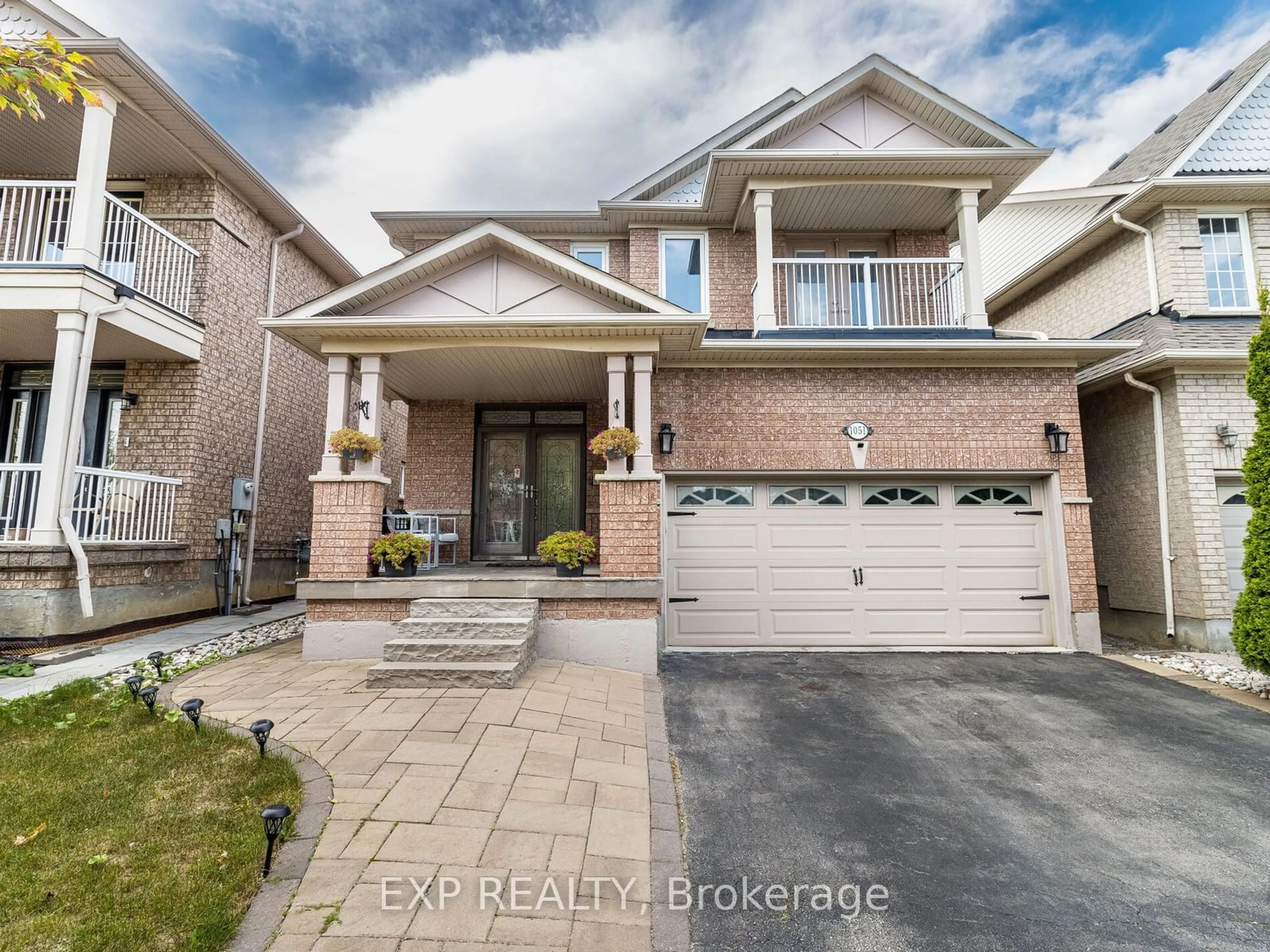 Frontside or backside of a home, the street view for 1051 McClenahan Cres, Milton Ontario L9T 6W6