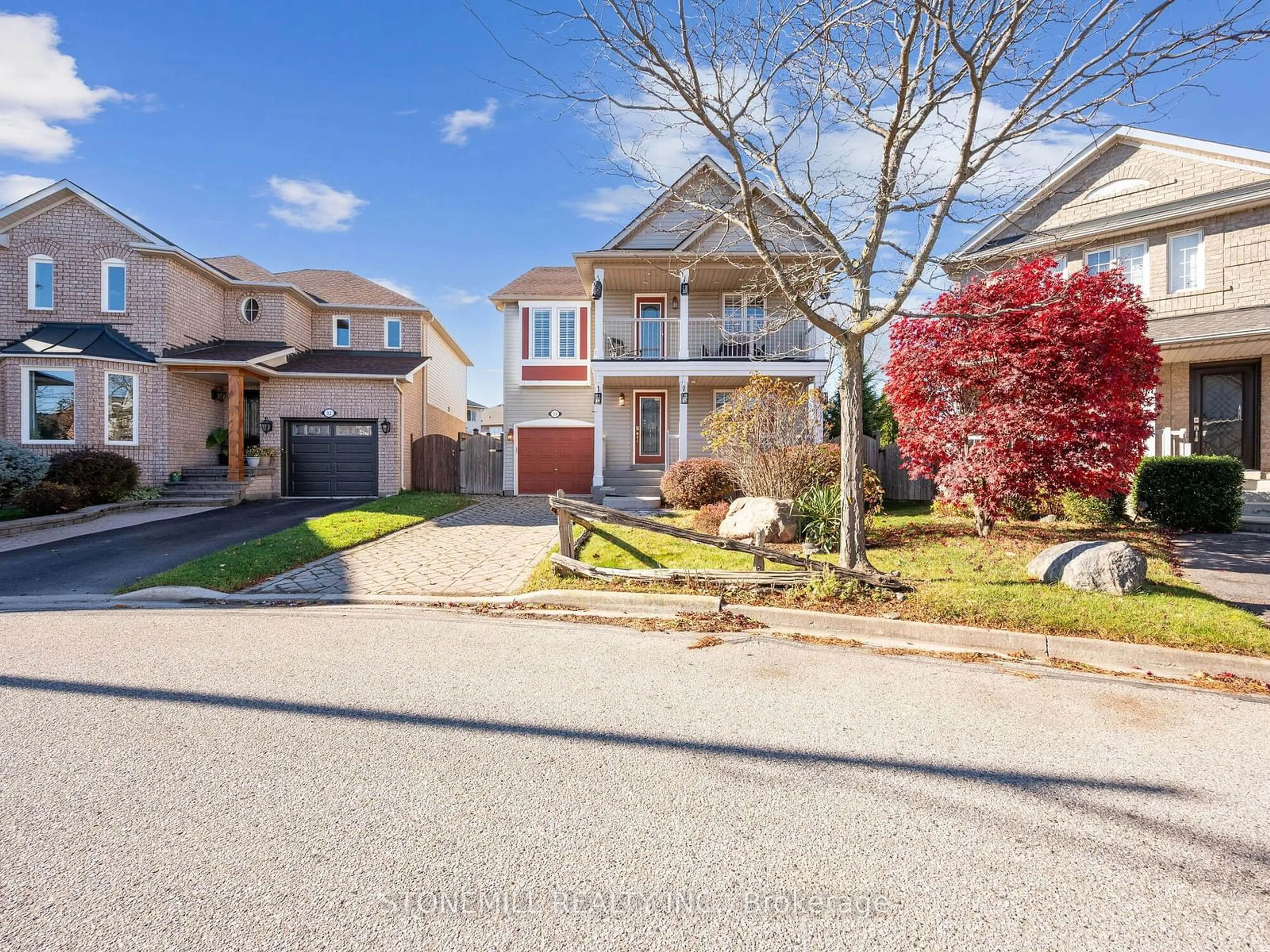 Frontside or backside of a home, the street view for 34 Babcock Cres, Milton Ontario L9T 5R4