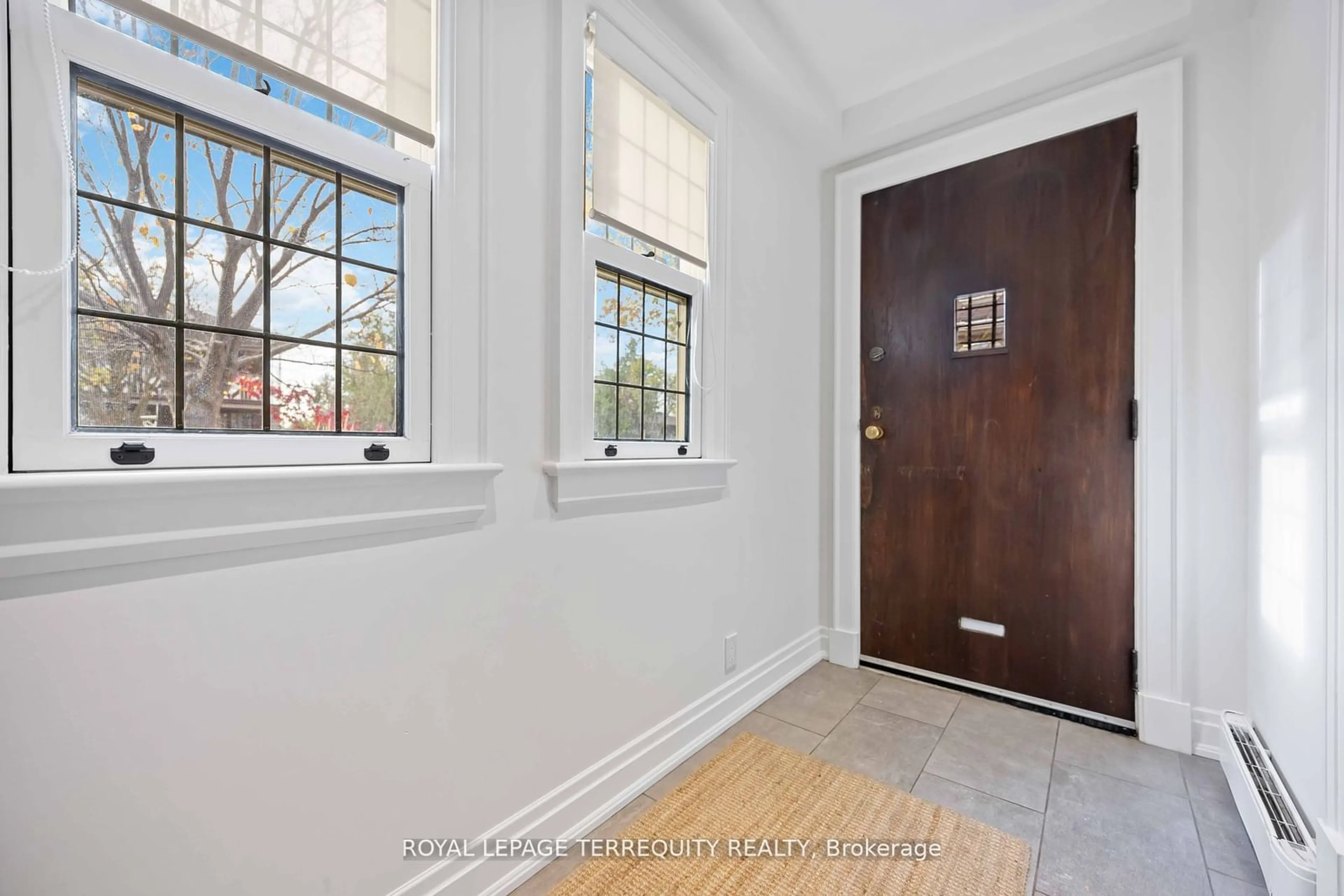 Indoor entryway, wood floors for 60 Bushey Ave, Toronto Ontario M6N 2R3