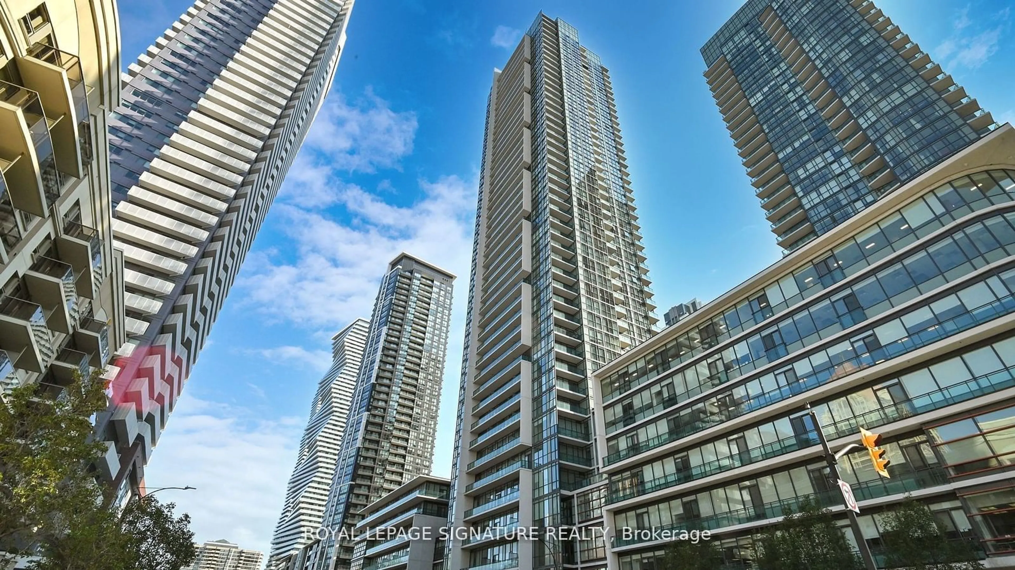 A pic from exterior of the house or condo, the view of city buildings for 4070 Confederation Pkwy #LPH4, Mississauga Ontario L5B 0E9