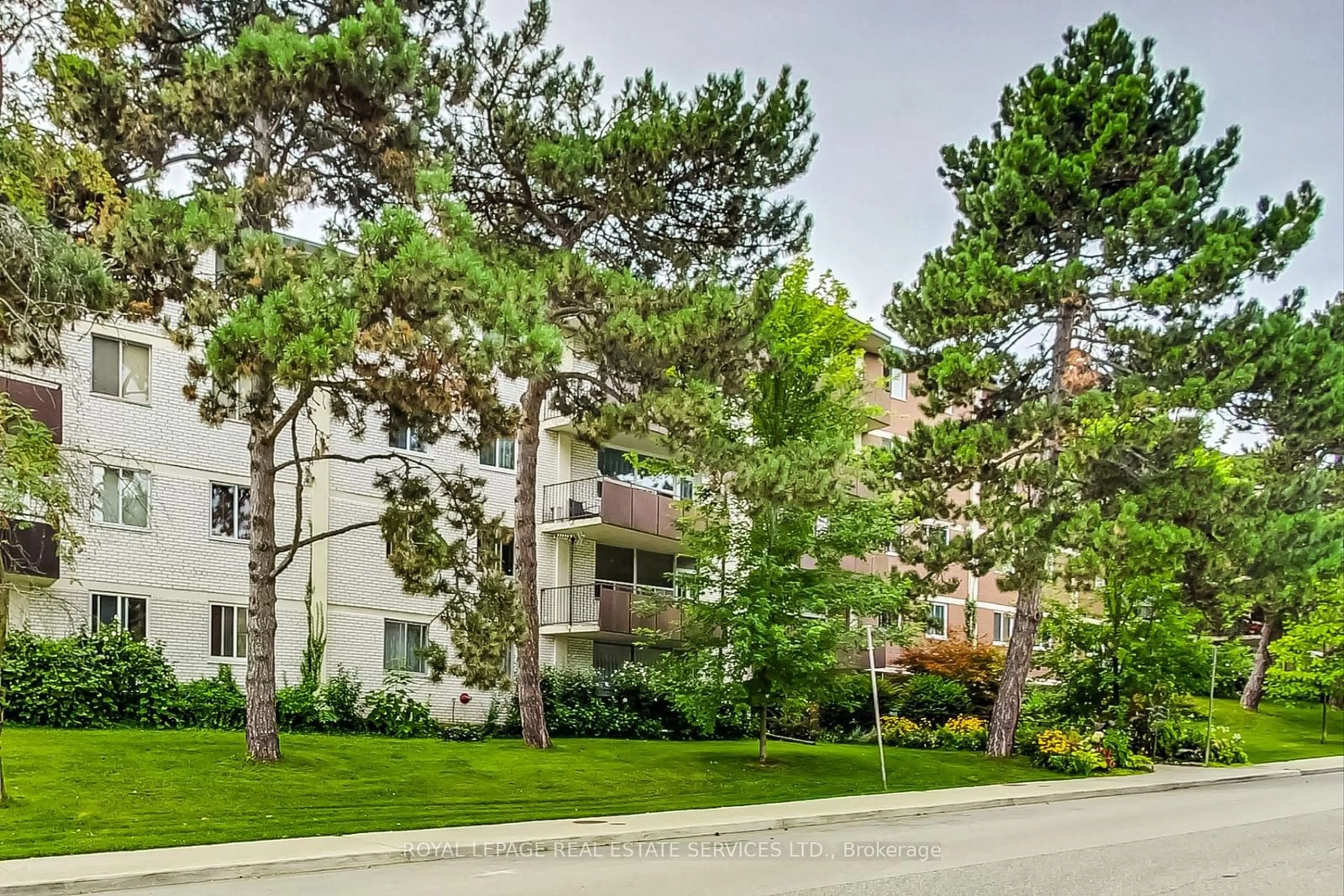 A pic from exterior of the house or condo, the street view for 80 Coe Hill Dr #416, Toronto Ontario M6S 3C9