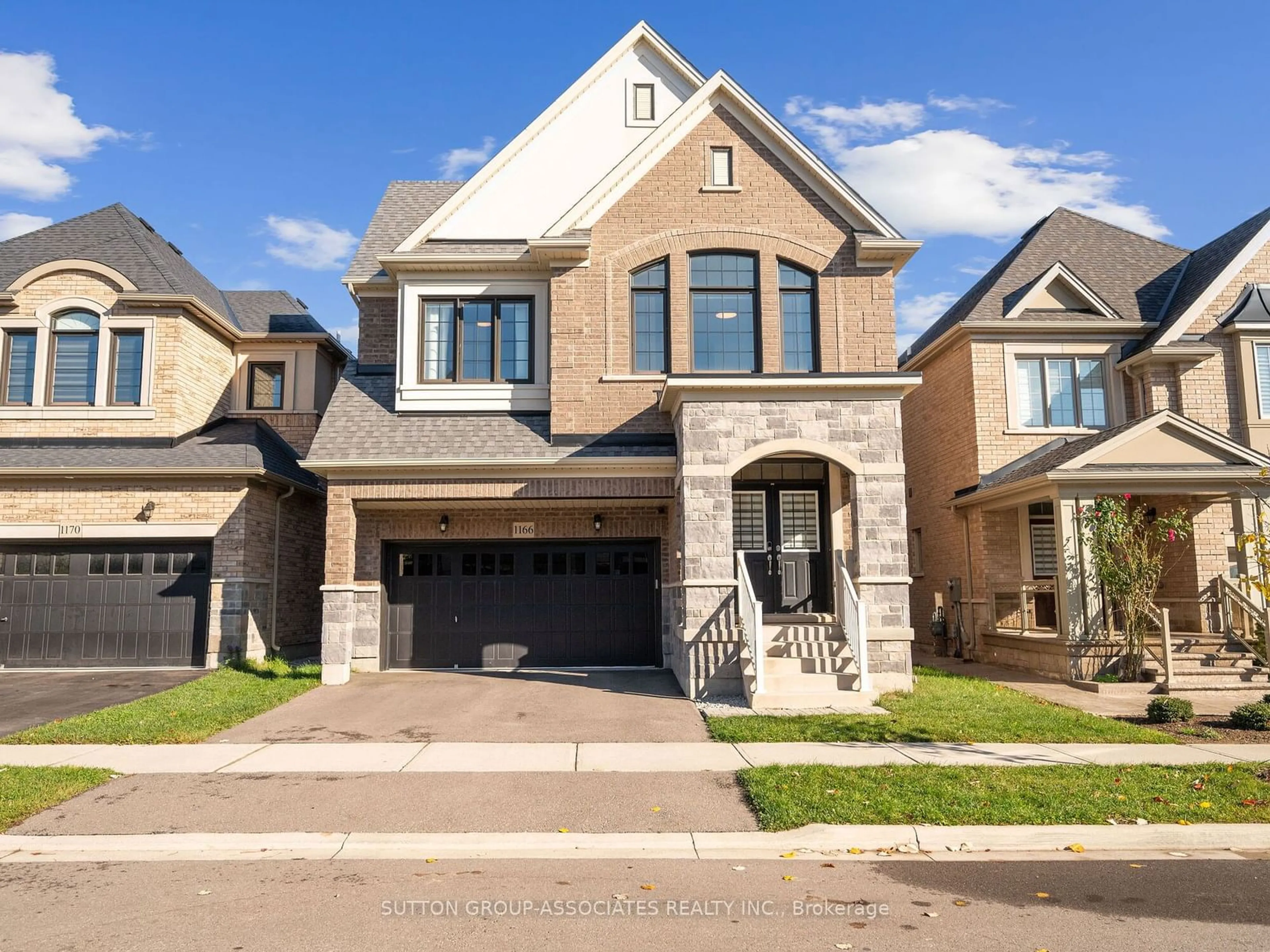 Frontside or backside of a home, the street view for 1166 Raspberry Terr, Milton Ontario L9E 1K3