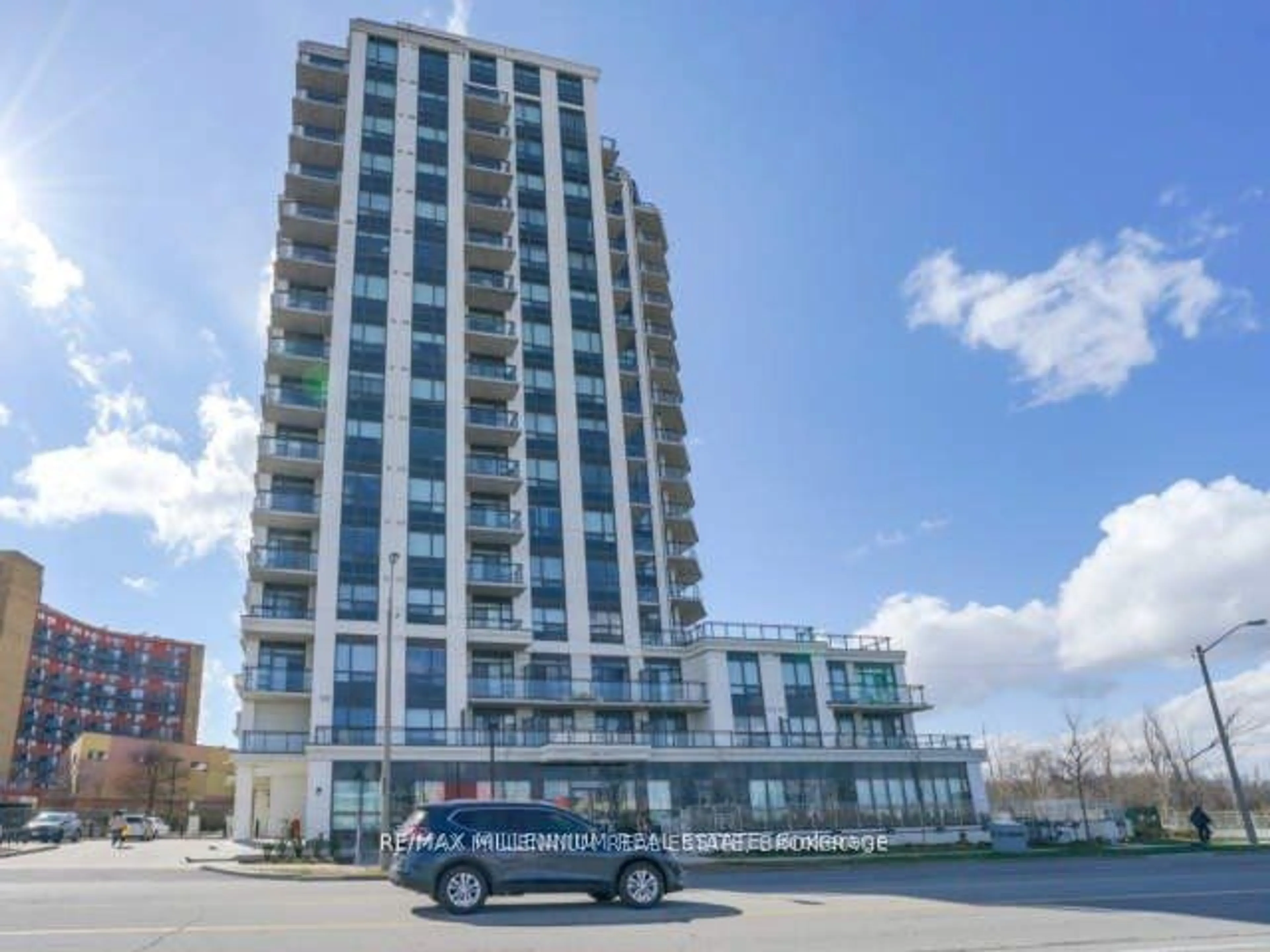 A pic from exterior of the house or condo, the front or back of building for 840 Queens Plate Dr #907, Toronto Ontario M9W 6Z3