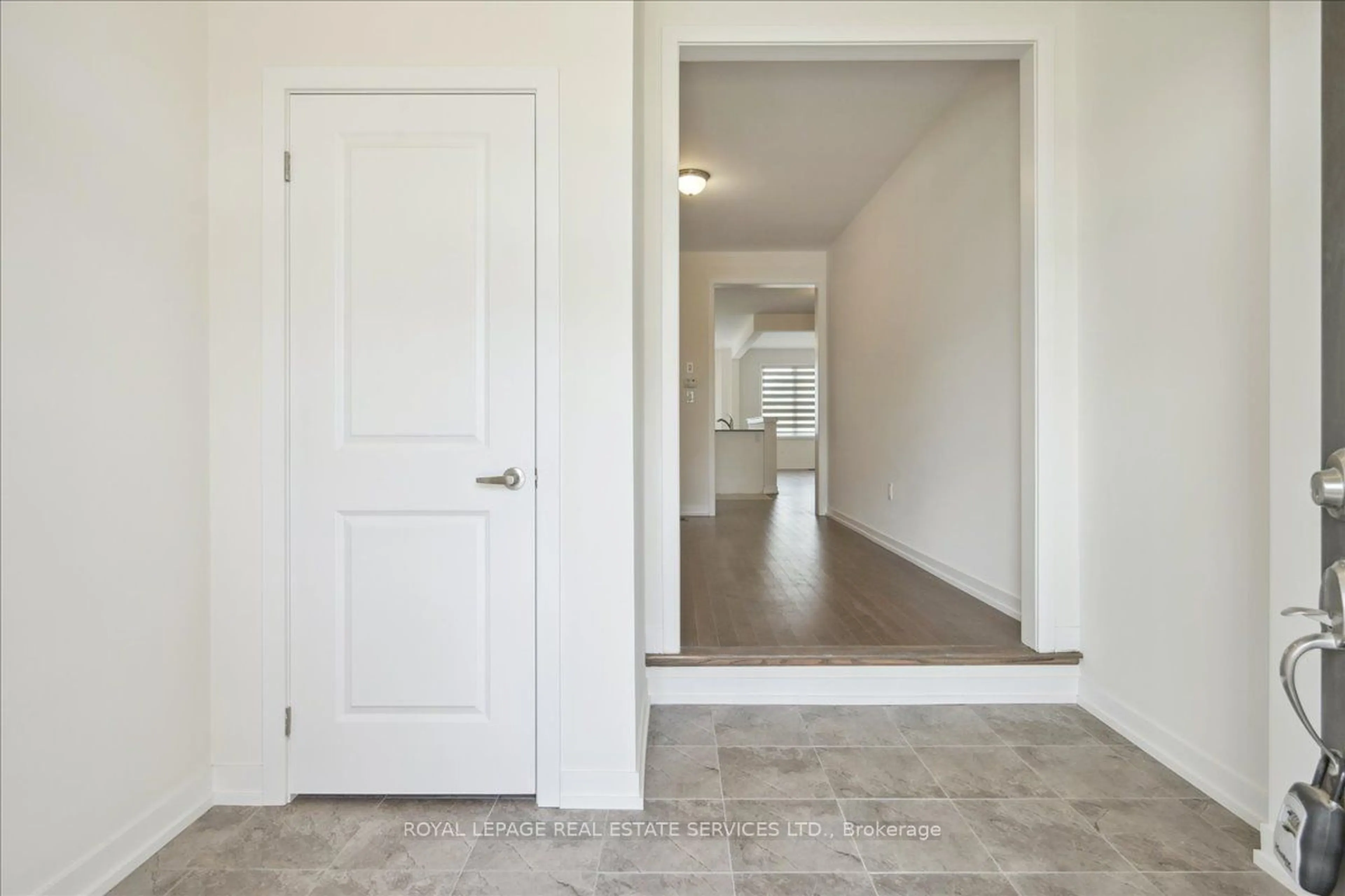 Indoor entryway, wood floors for 1472 Rose Way, Milton Ontario L9T 7E7