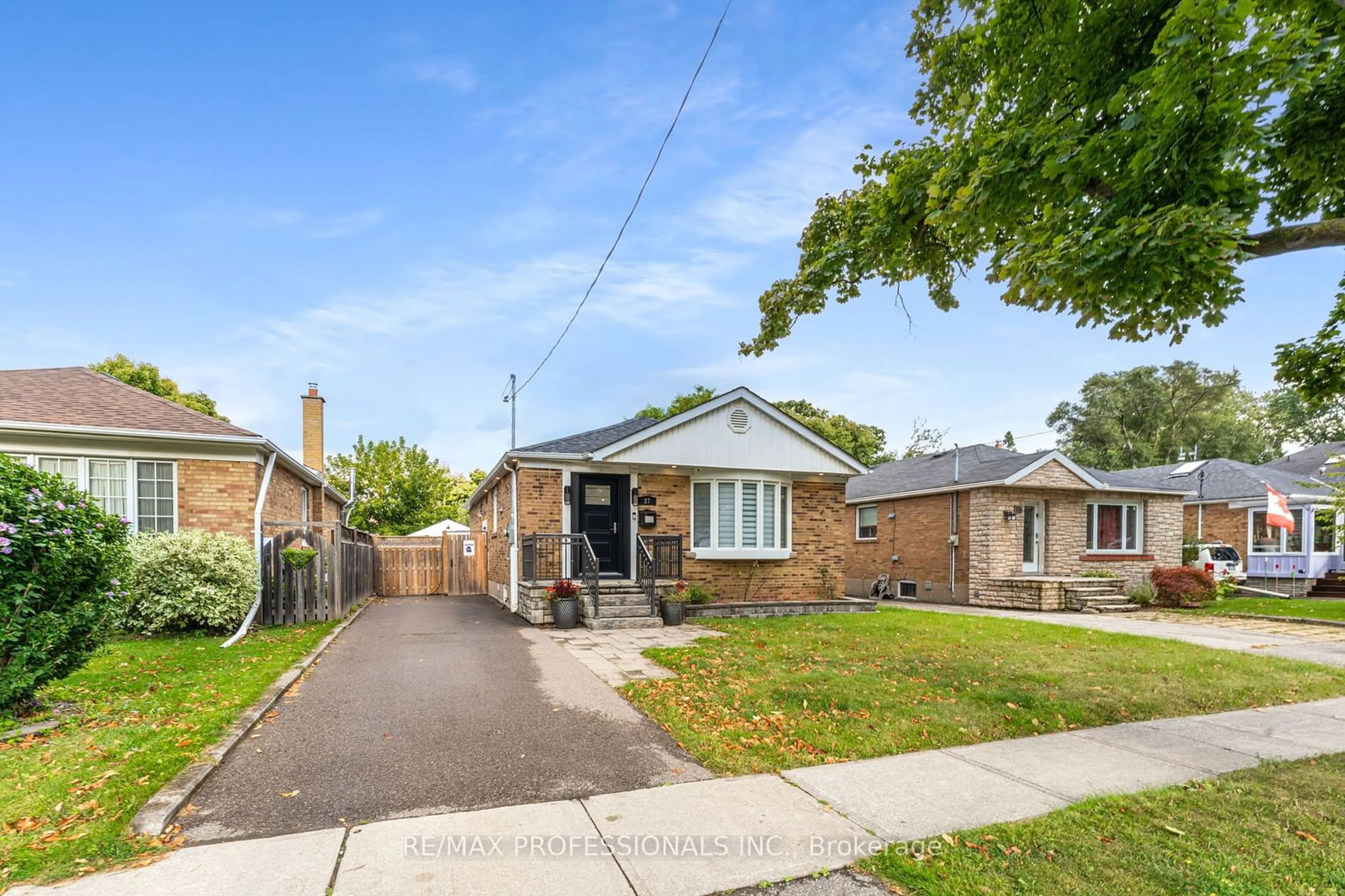 Frontside or backside of a home, the fenced backyard for 27 Charleston Rd, Toronto Ontario M9B 4M6