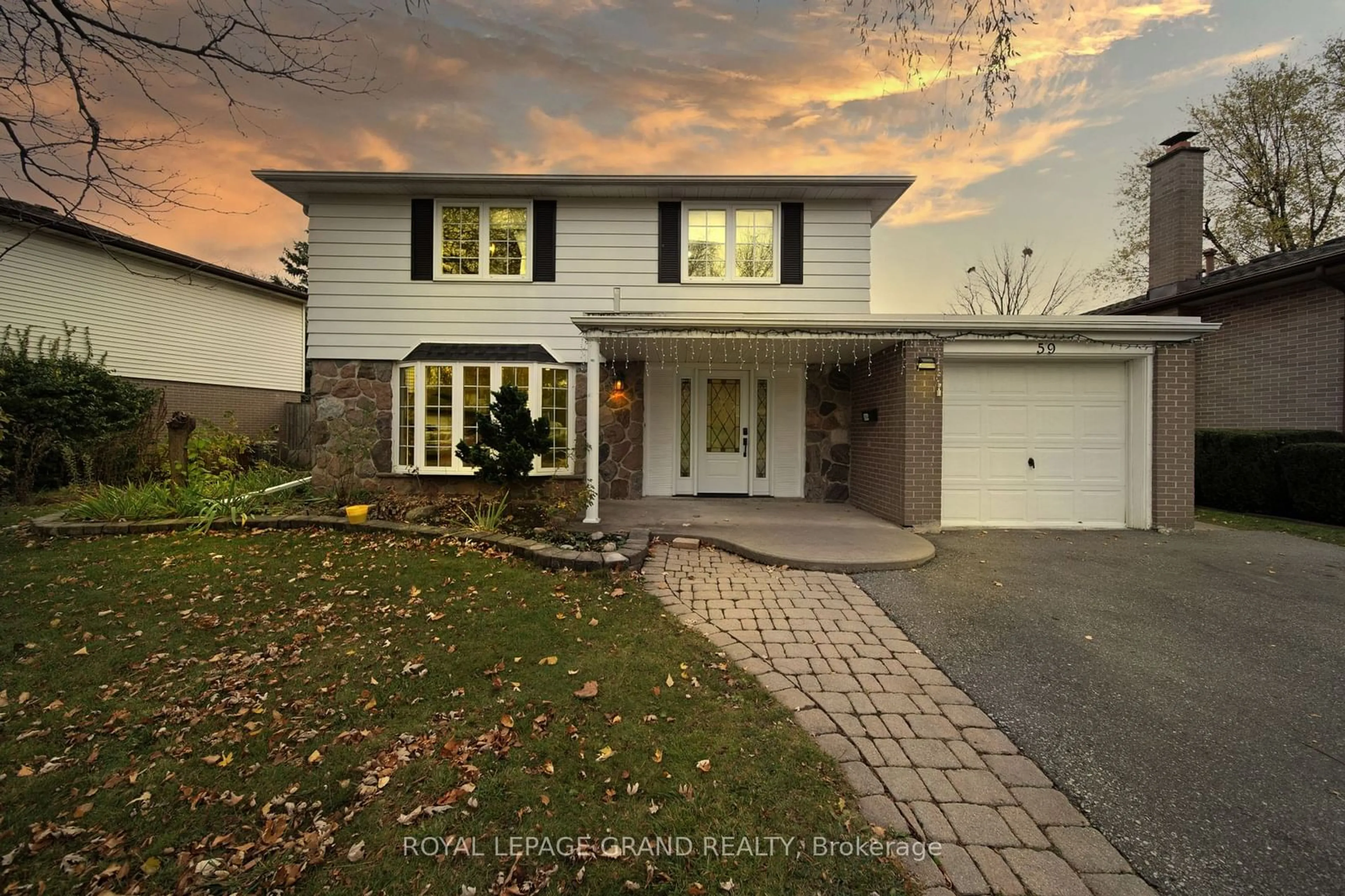 Frontside or backside of a home, the street view for 59 Roberts Cres, Brampton Ontario L6W 1G9