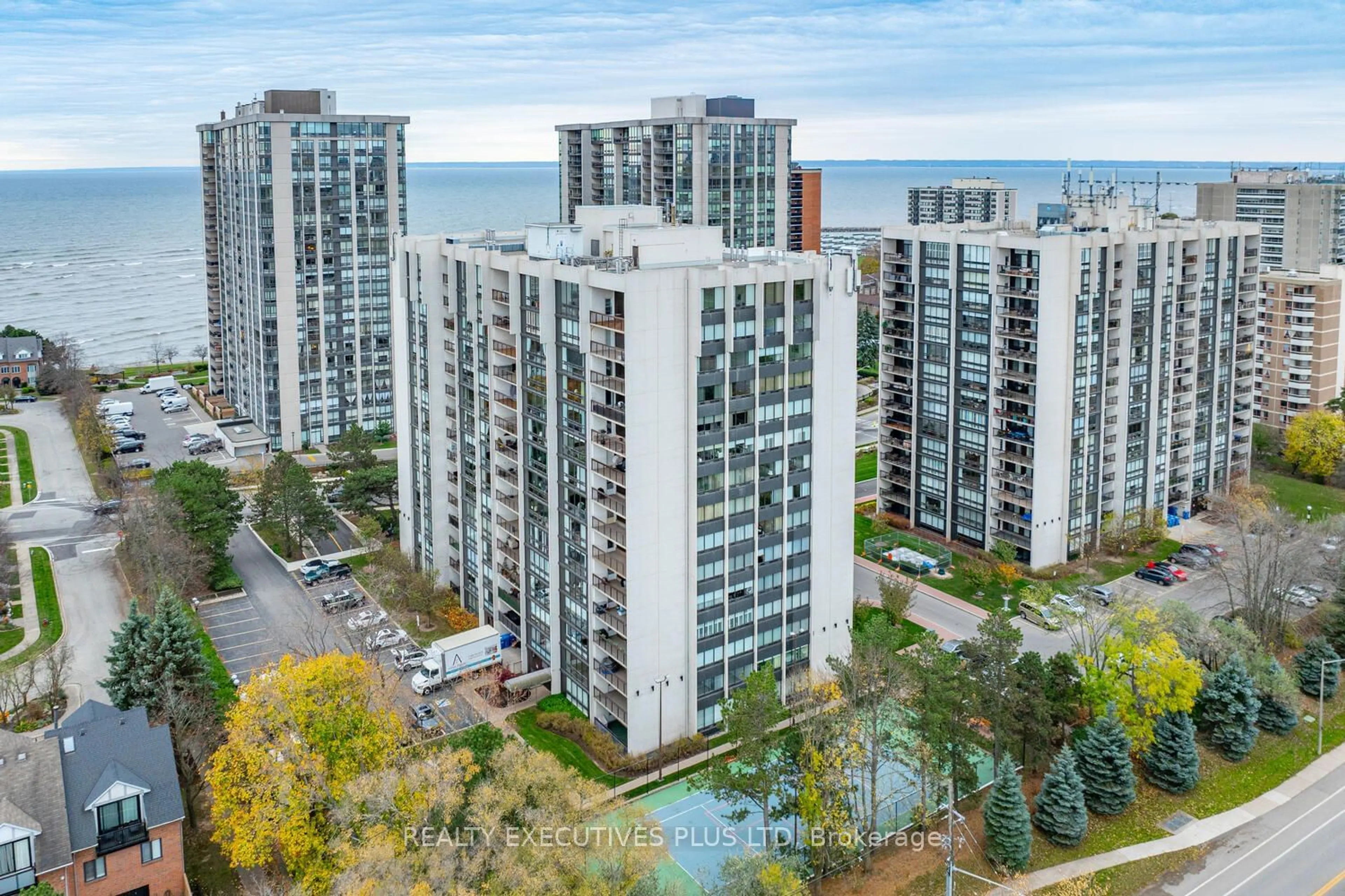 A pic from exterior of the house or condo, the view of city buildings for 2175 Marine Dr #202, Oakville Ontario L6L 5L5