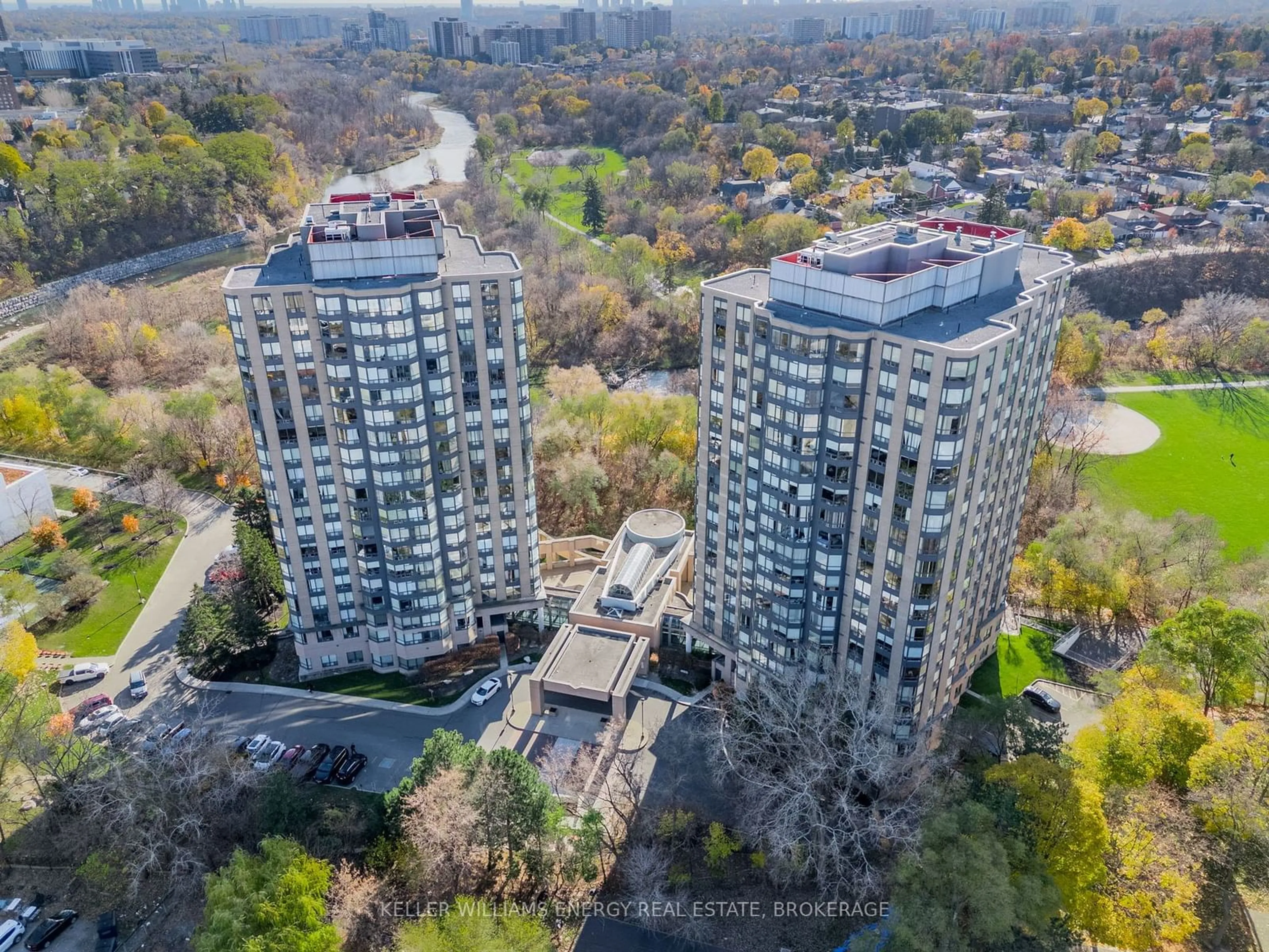 A pic from exterior of the house or condo, the view of city buildings for 3 Hickory Tree Rd #403, Toronto Ontario M9N 3W5