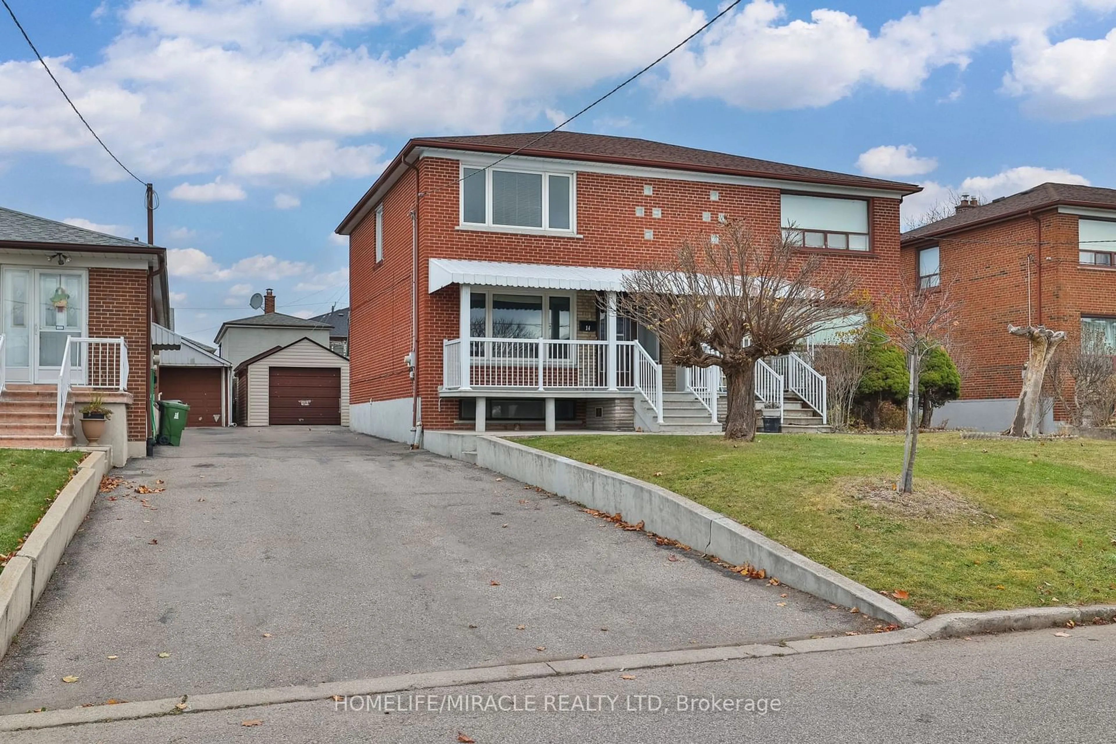 Frontside or backside of a home, the street view for 14 Dombey Rd, Toronto Ontario M3L 1N9