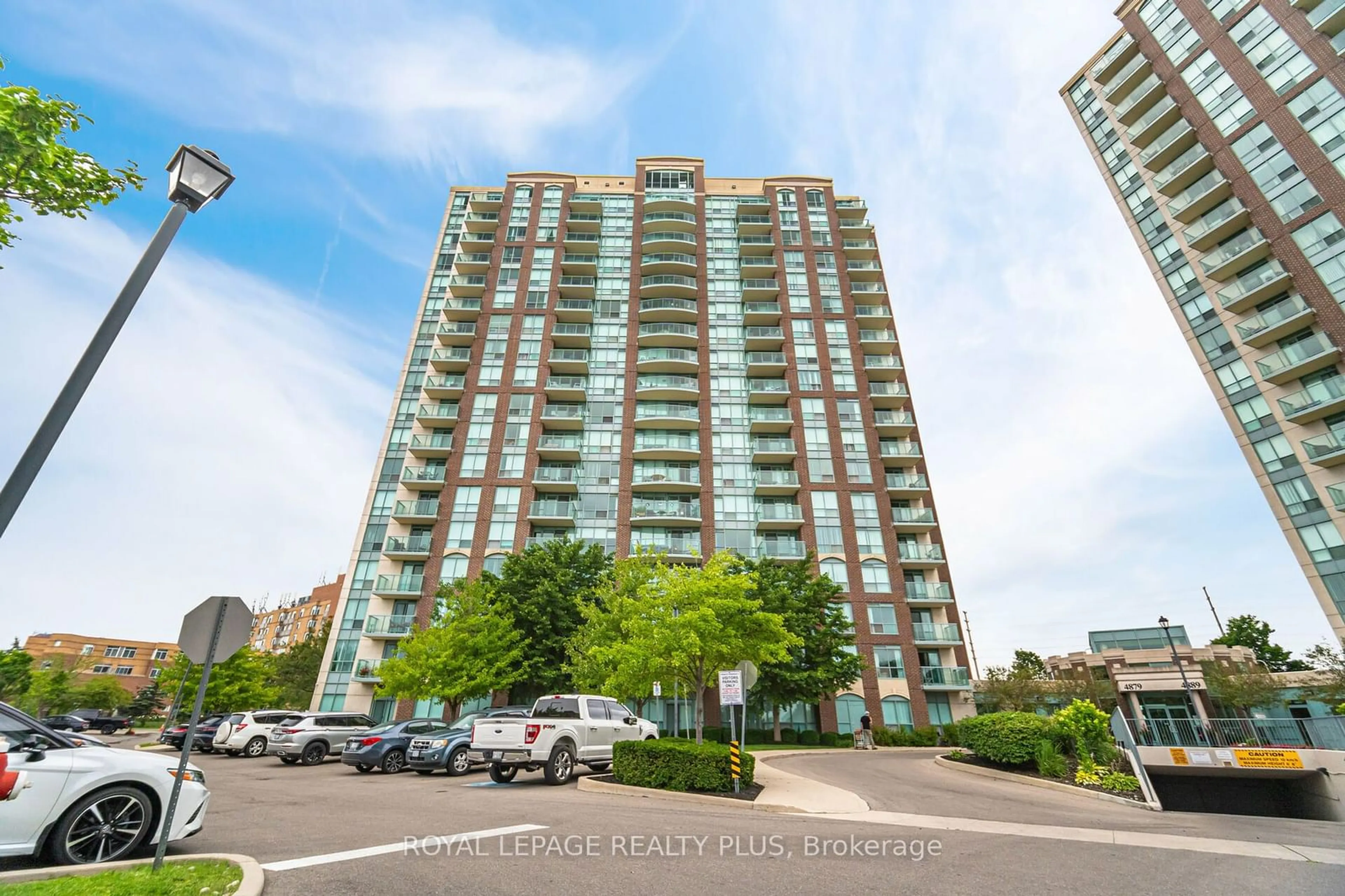 A pic from exterior of the house or condo, the street view for 4879 Kimbermount Ave #304, Mississauga Ontario L5M 7R8