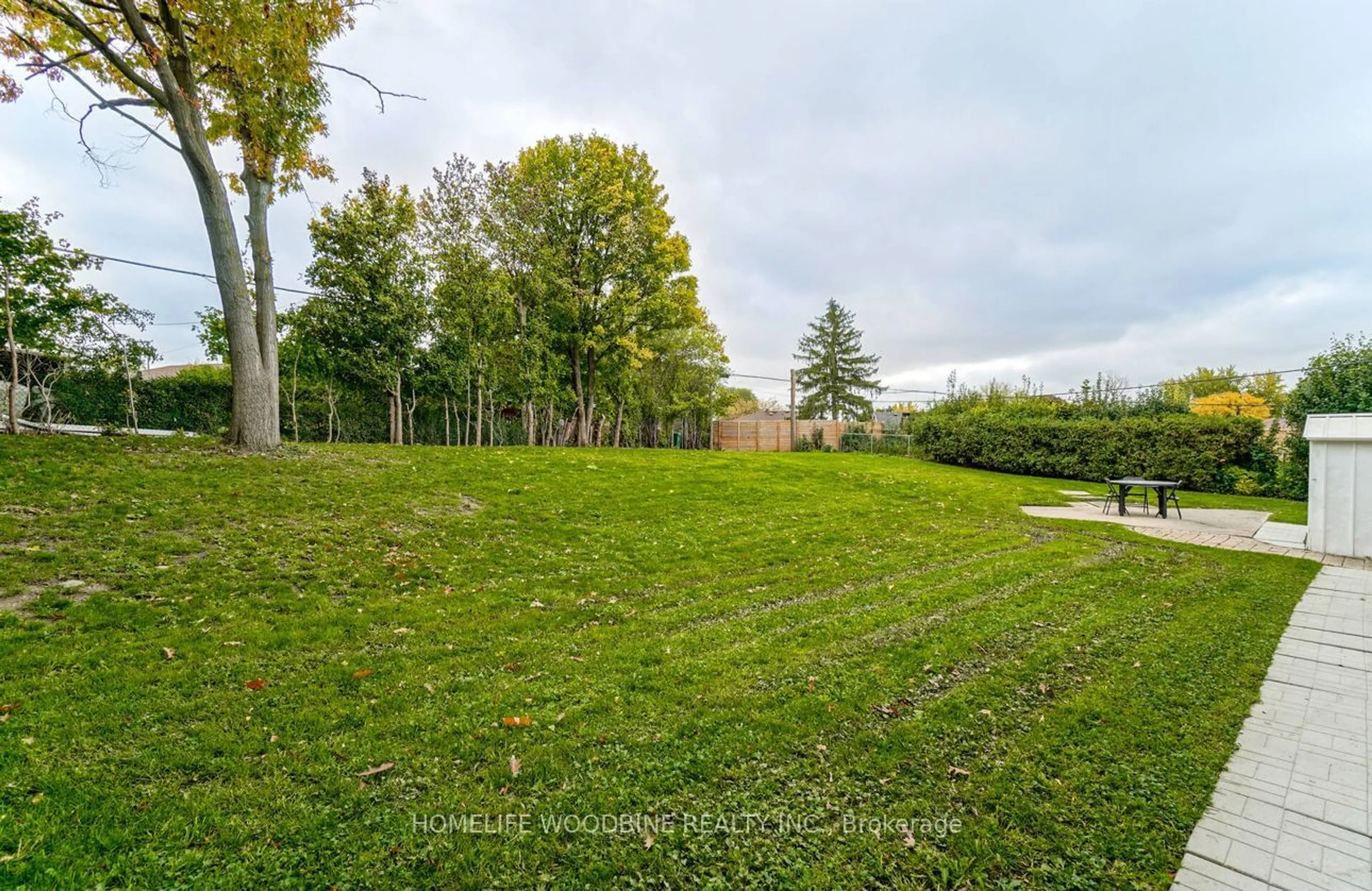 Patio, the fenced backyard for 30 Lawrence Cres, Brampton Ontario L6W 2P3