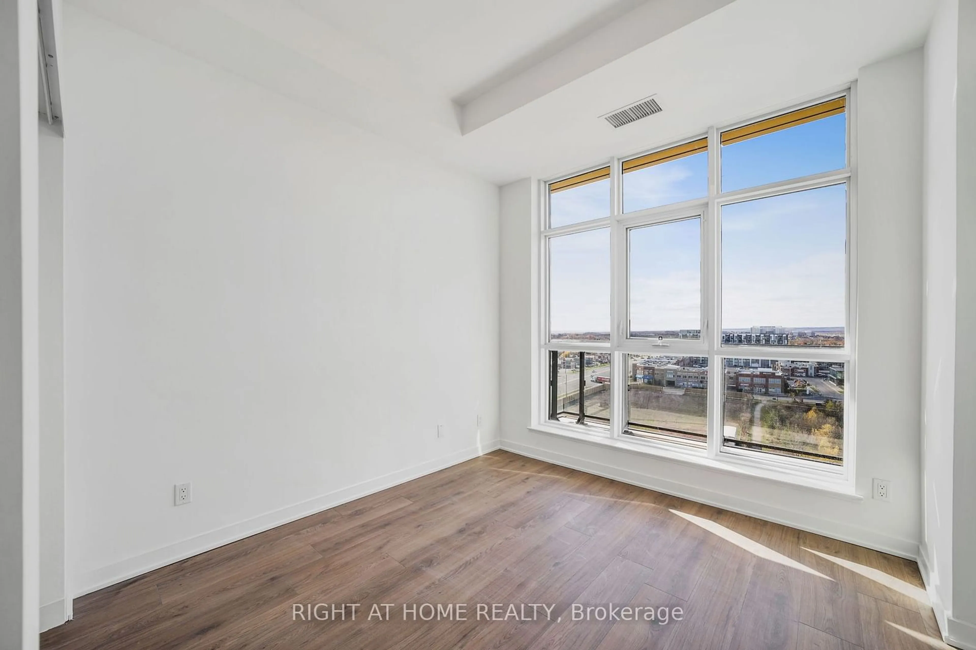 A pic of a room, wood floors for 405 Dundas St #PH05, Oakville Ontario L6M 4P9