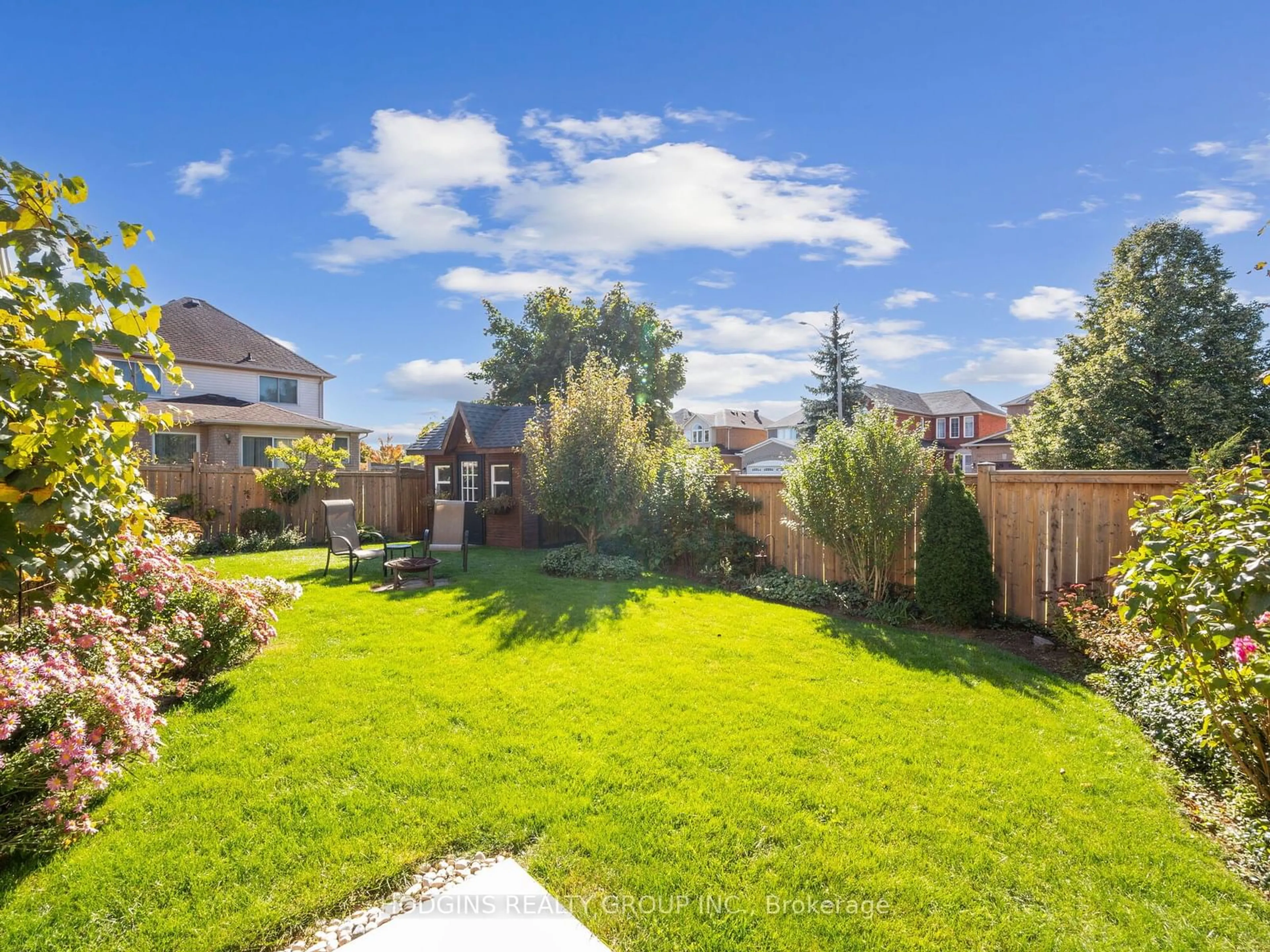 Frontside or backside of a home, the fenced backyard for 3621 Forest Bluff Cres, Mississauga Ontario L5N 7W8