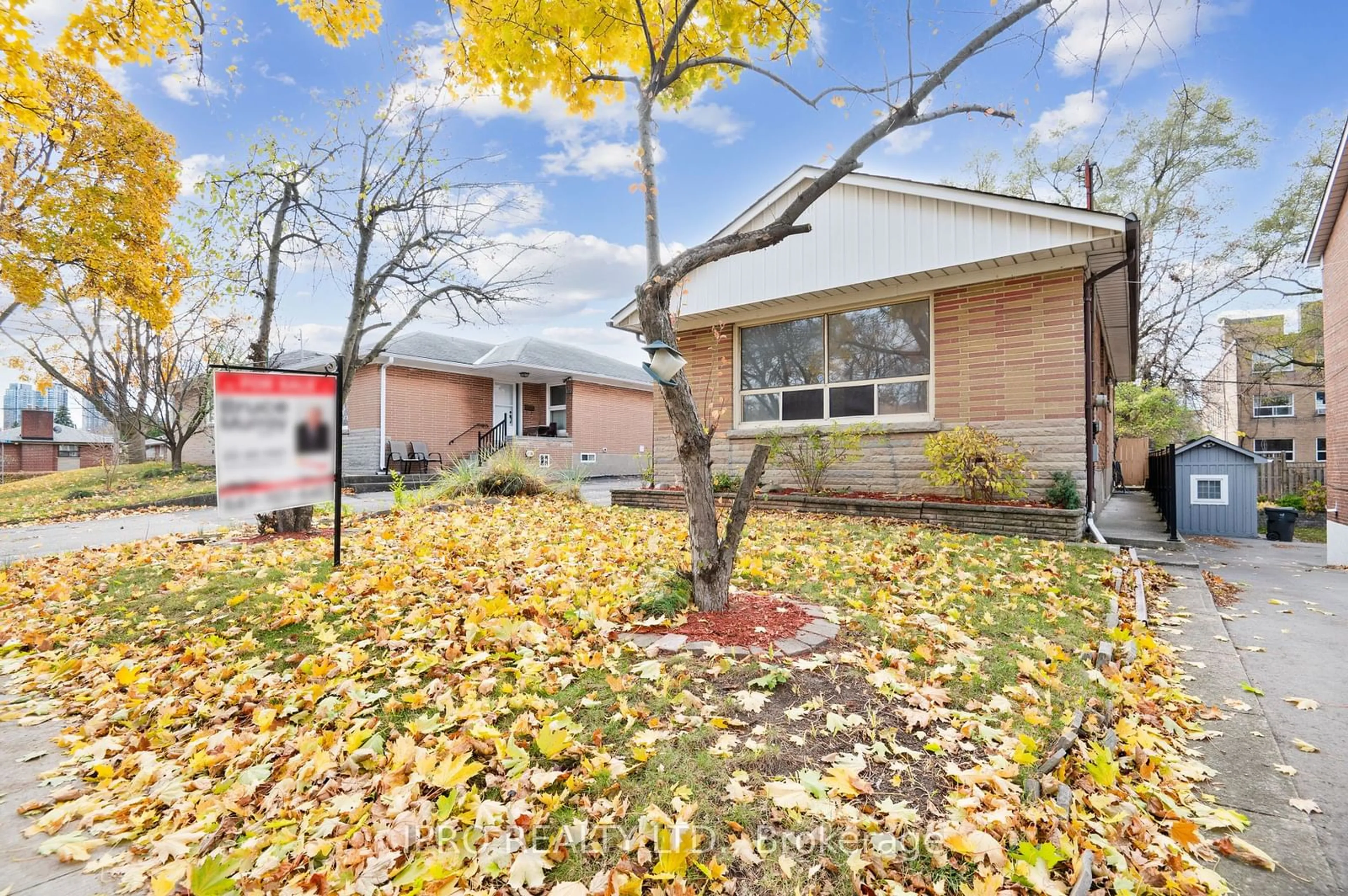 A pic from exterior of the house or condo, the fenced backyard for 90 Stephen Dr, Toronto Ontario M8Y 3N3