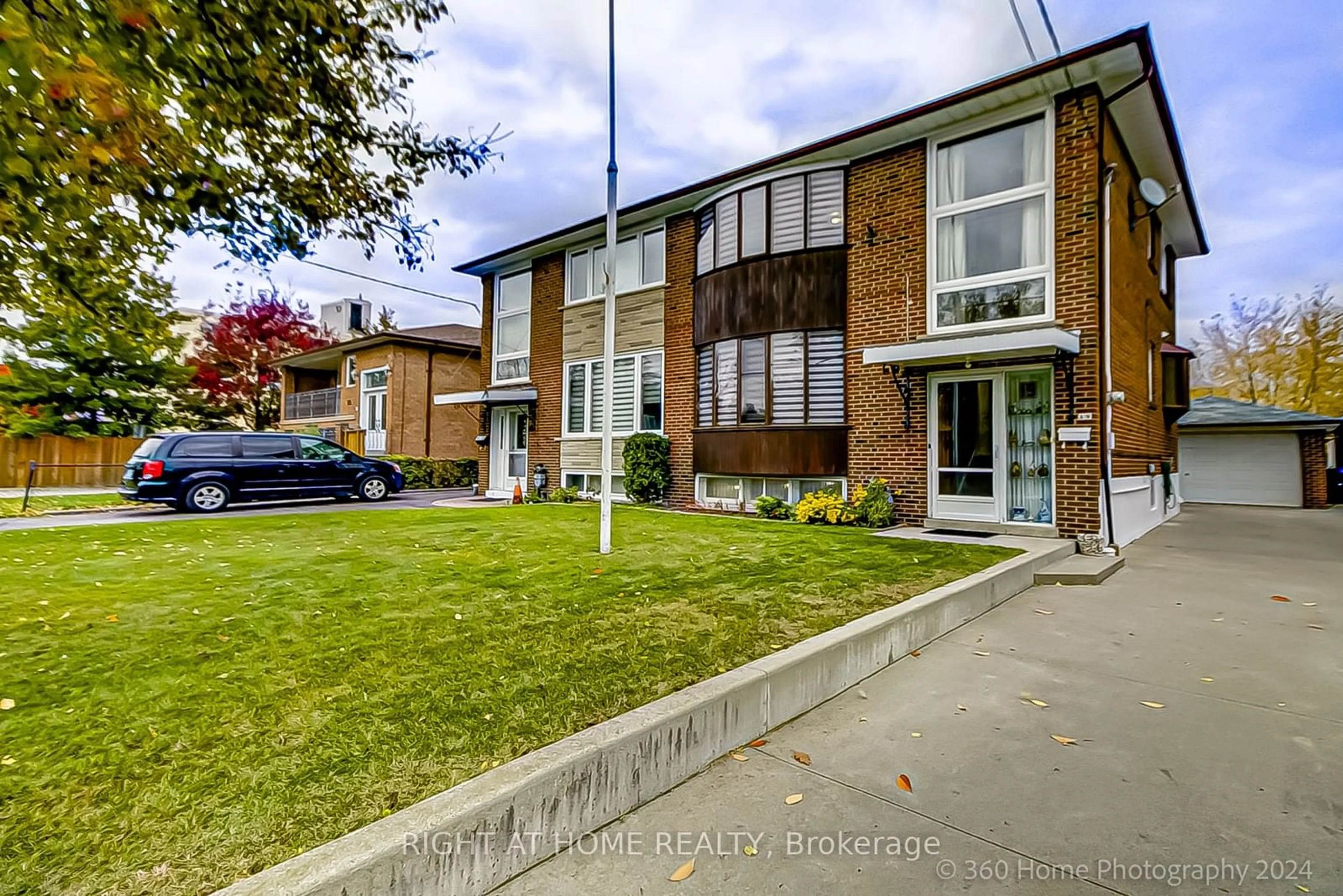 A pic from exterior of the house or condo, the street view for 19 Martini Dr, Toronto Ontario M6M 4X4