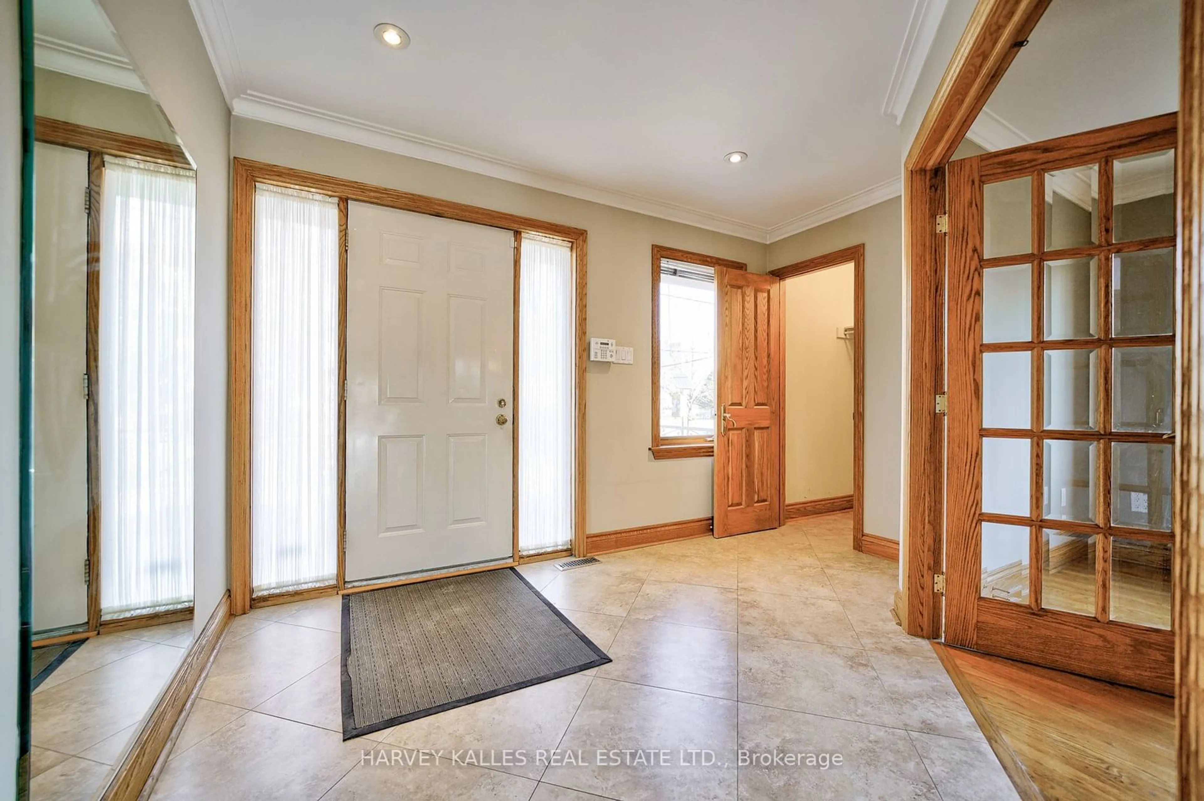 Indoor foyer, wood floors for 47 Claver Ave, Toronto Ontario M6B 2V9