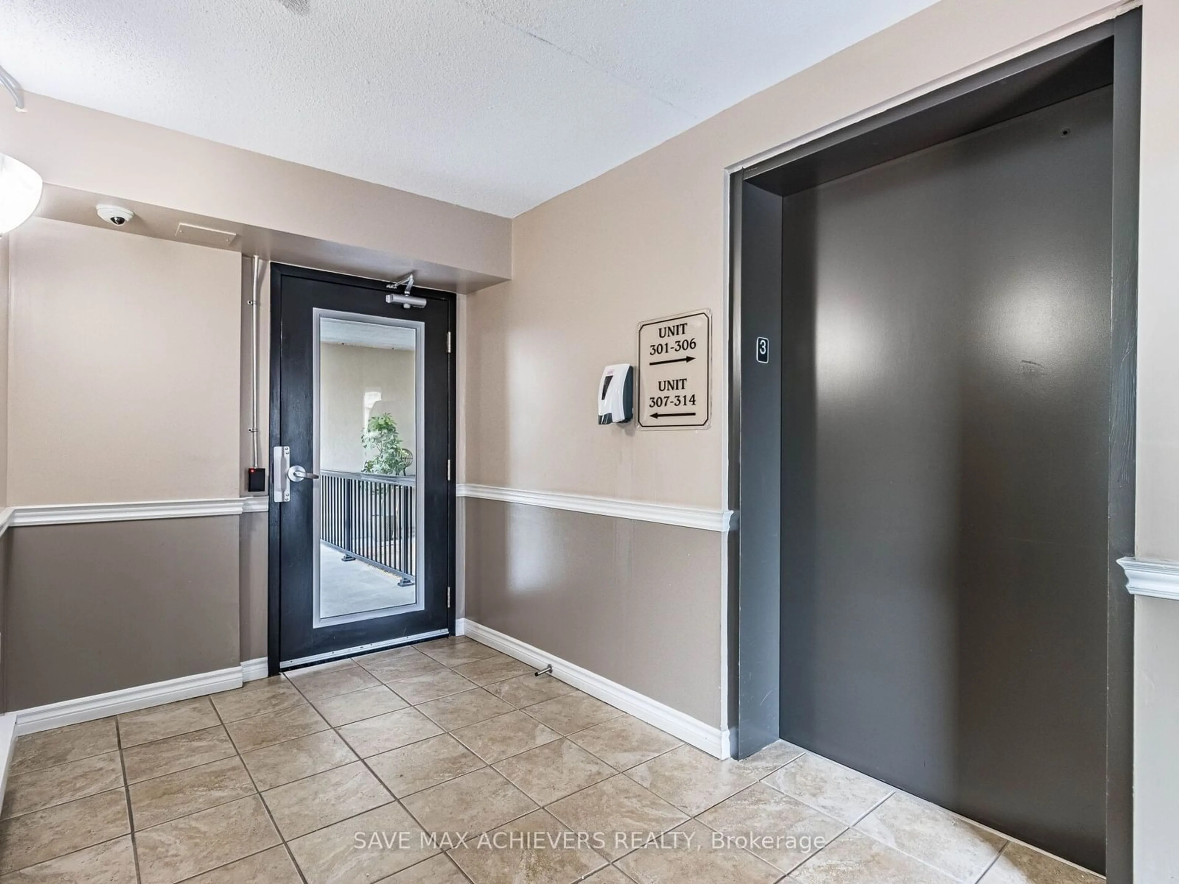 Indoor entryway, cement floor for 1350 Main St #310, Milton Ontario L9T 7S7