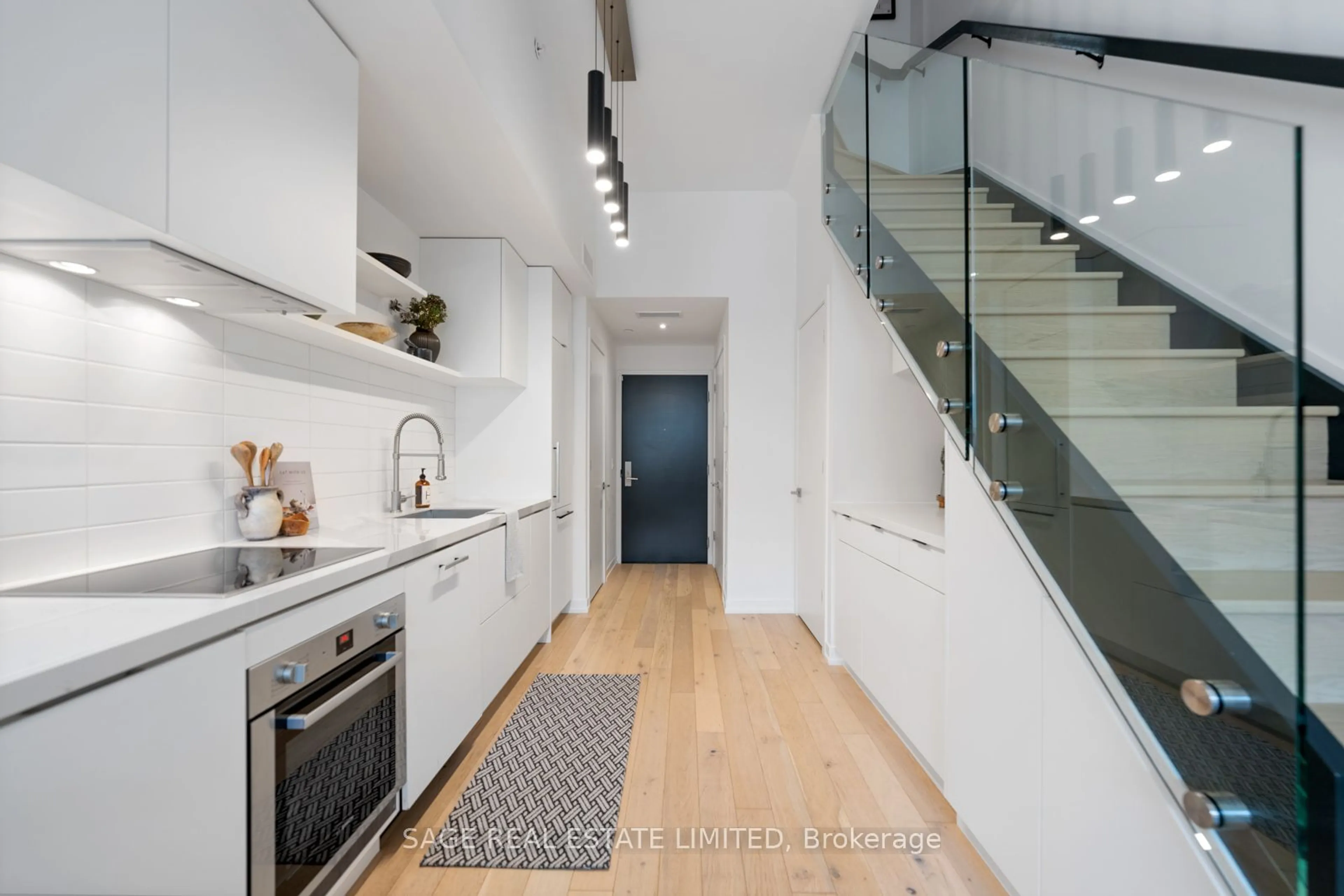 Contemporary kitchen, wood floors for 35 Wabash Ave #121, Toronto Ontario M6R 0A9