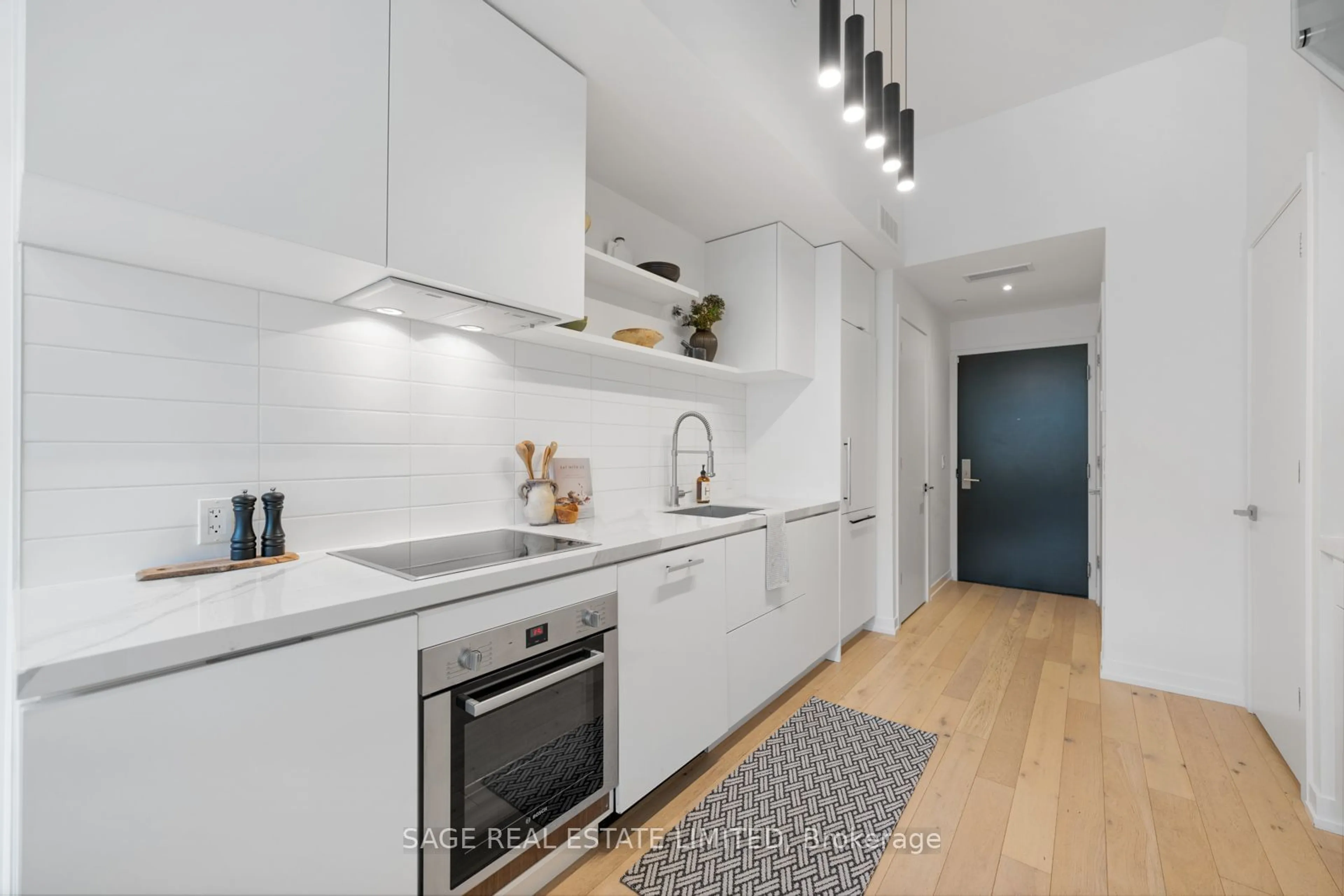 Contemporary kitchen, wood floors for 35 Wabash Ave #121, Toronto Ontario M6R 0A9