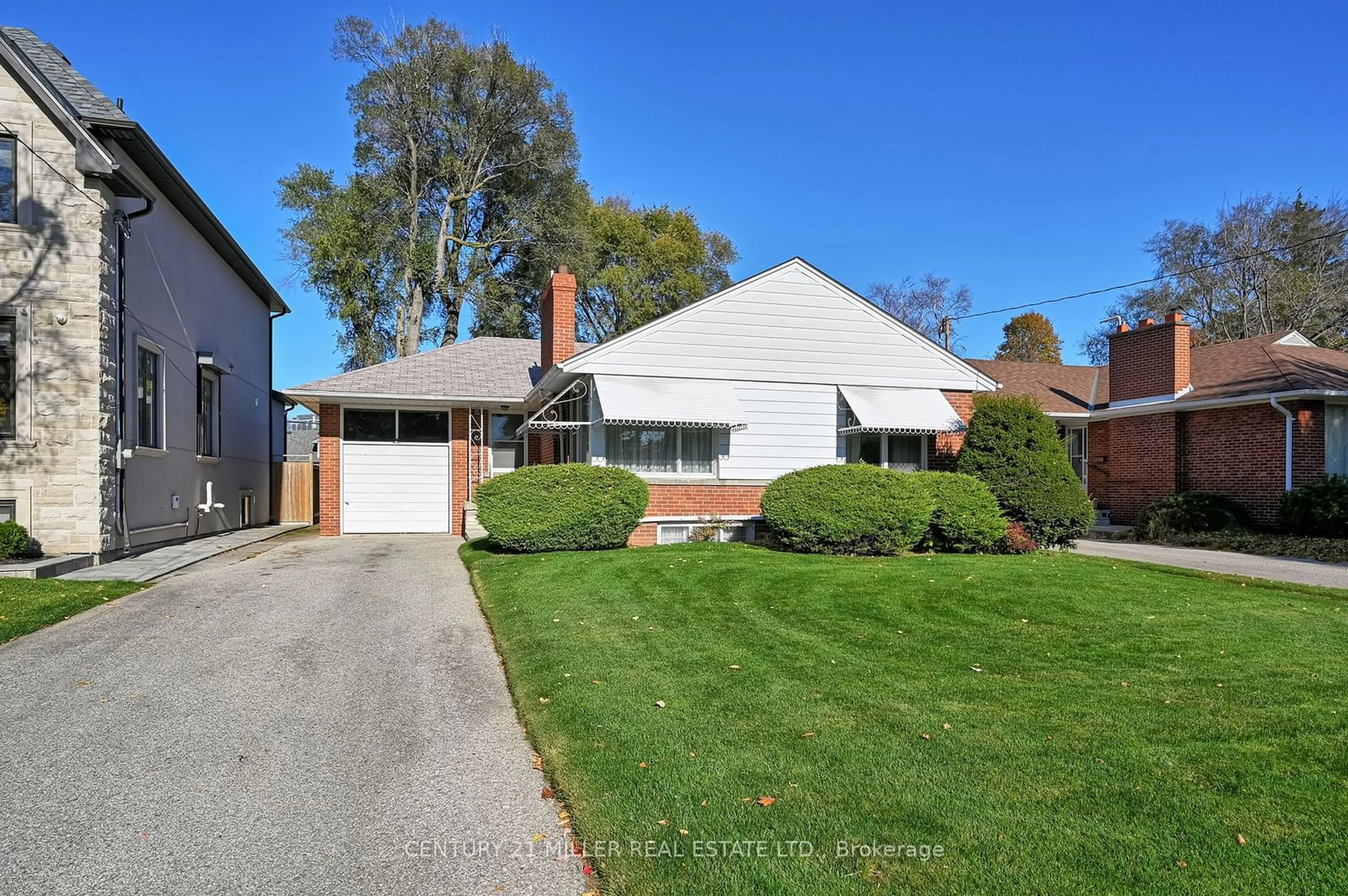 Frontside or backside of a home, the street view for 26 Saybrook Ave, Toronto Ontario M8Z 2V4