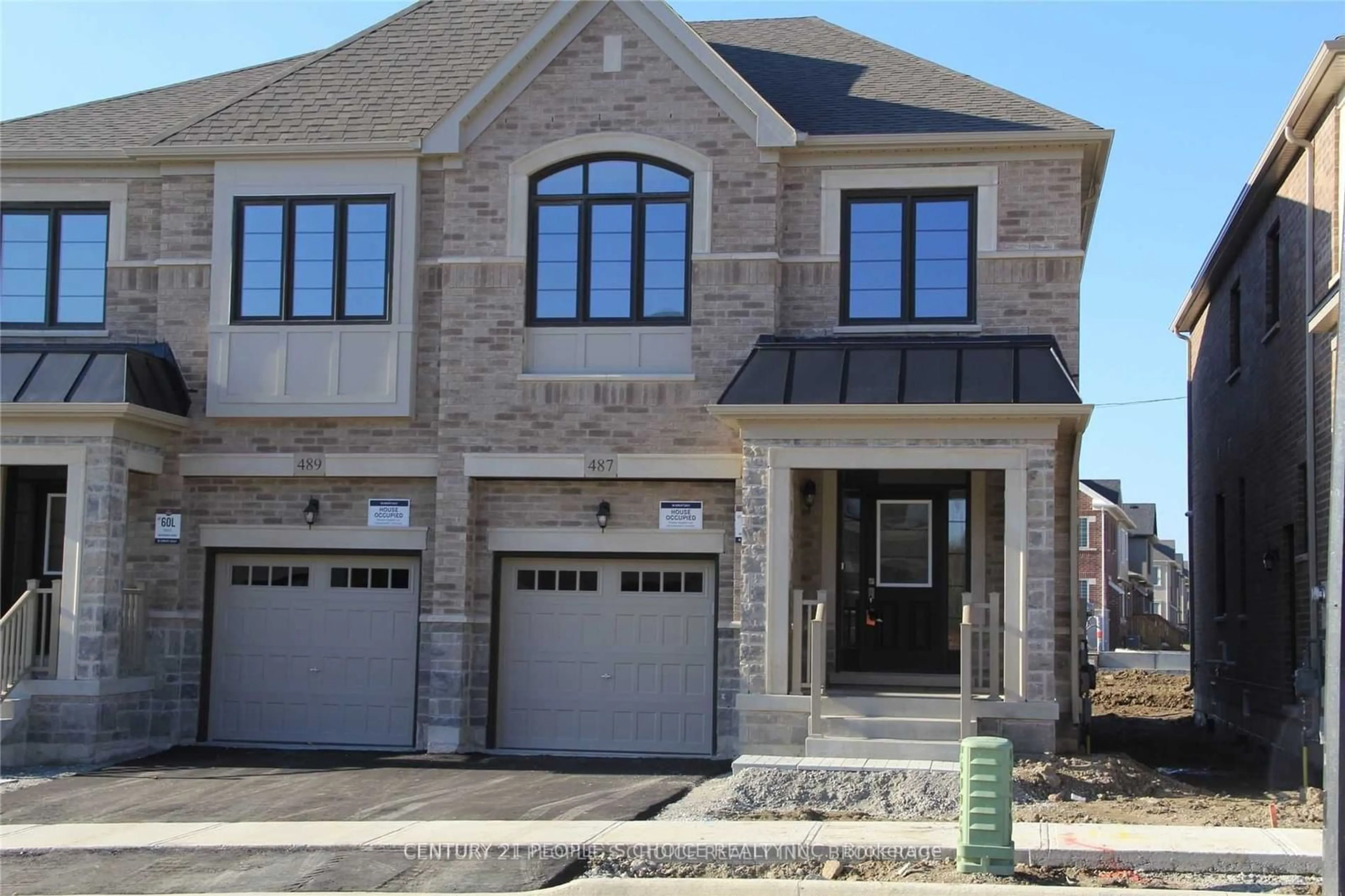 Home with brick exterior material for 487 Bergamot Ave, Milton Ontario L9E 1T8