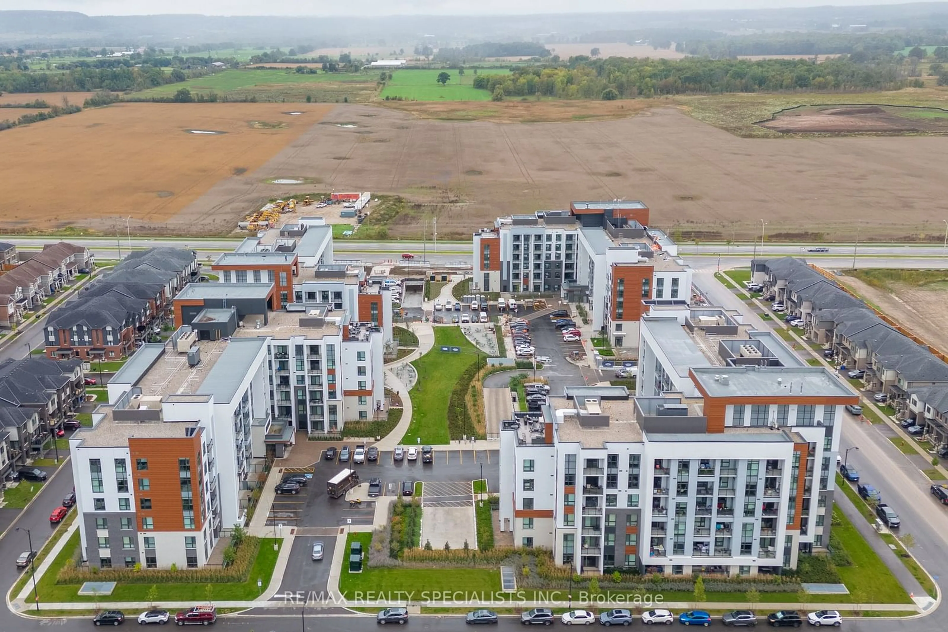 A pic from exterior of the house or condo, the view of city buildings for 470 Gordon Krantz Ave #313, Milton Ontario L9E 1Z3