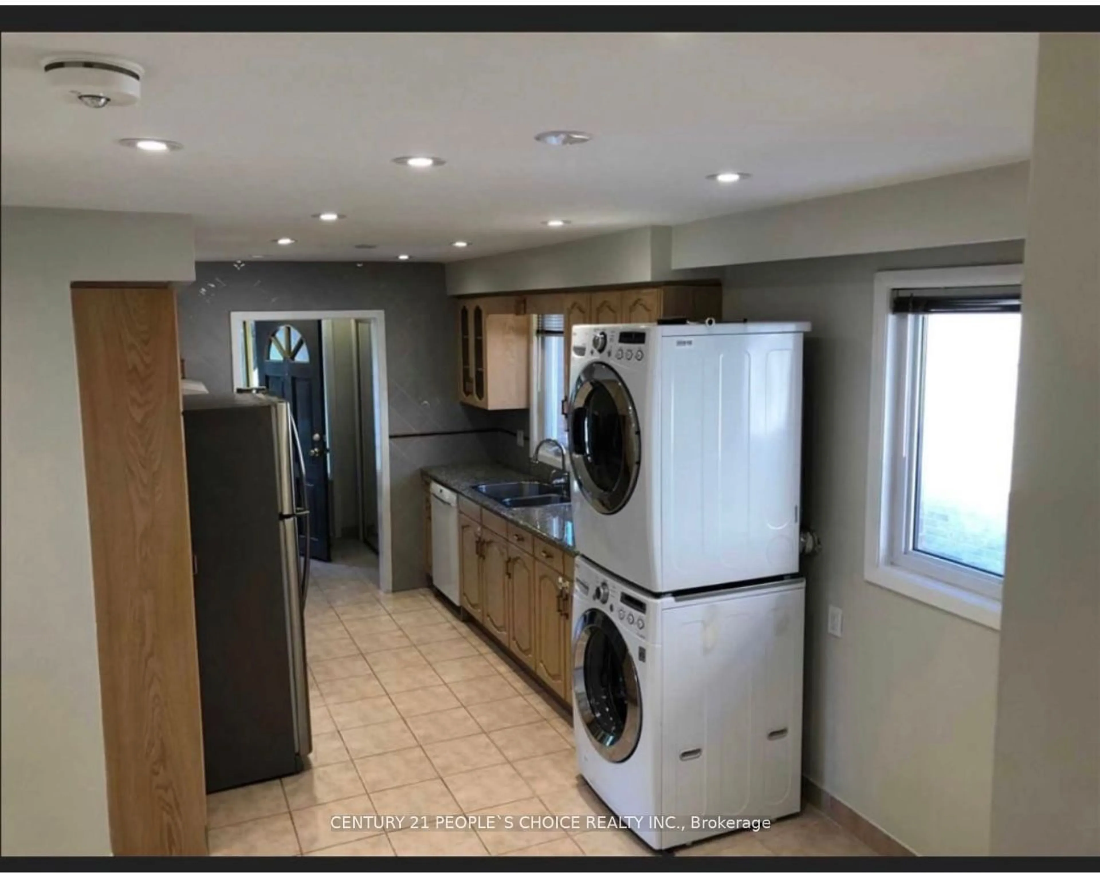 Kitchen with laundary machines, ceramic floors for 2 Delbasso Crt, Toronto Ontario M9R 1W6