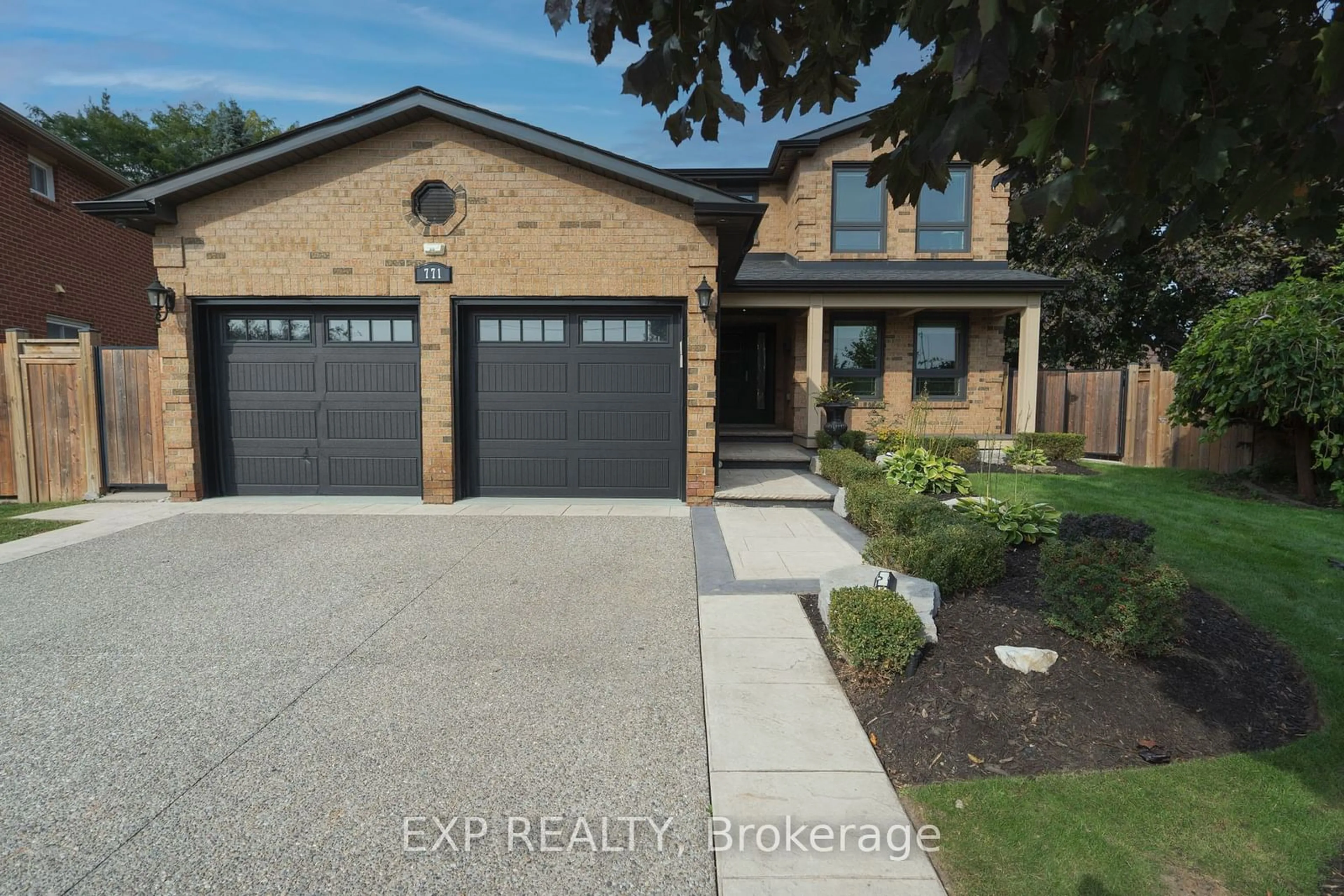 Frontside or backside of a home, the street view for 771 Ajyn Crt, Mississauga Ontario L4Y 4E9