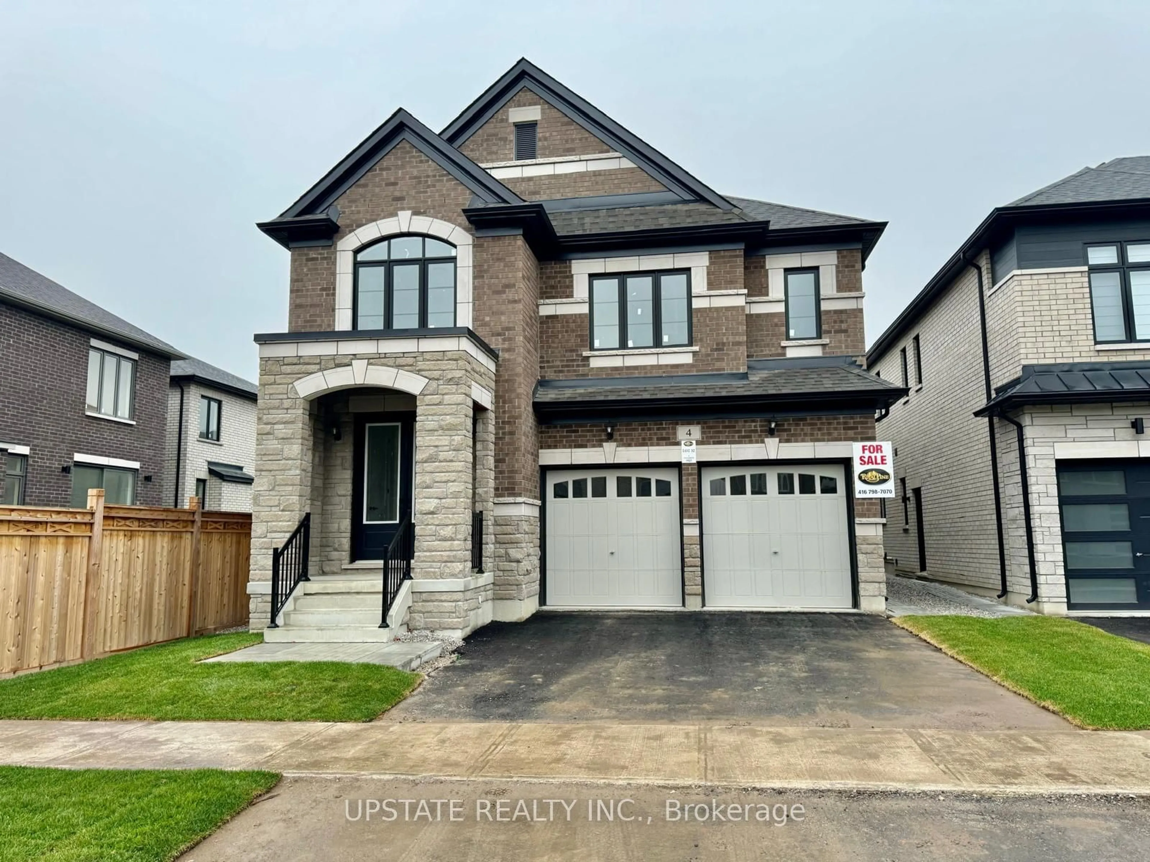 Frontside or backside of a home, the street view for 4 Dolomite Dr, Brampton Ontario L6P 4R6