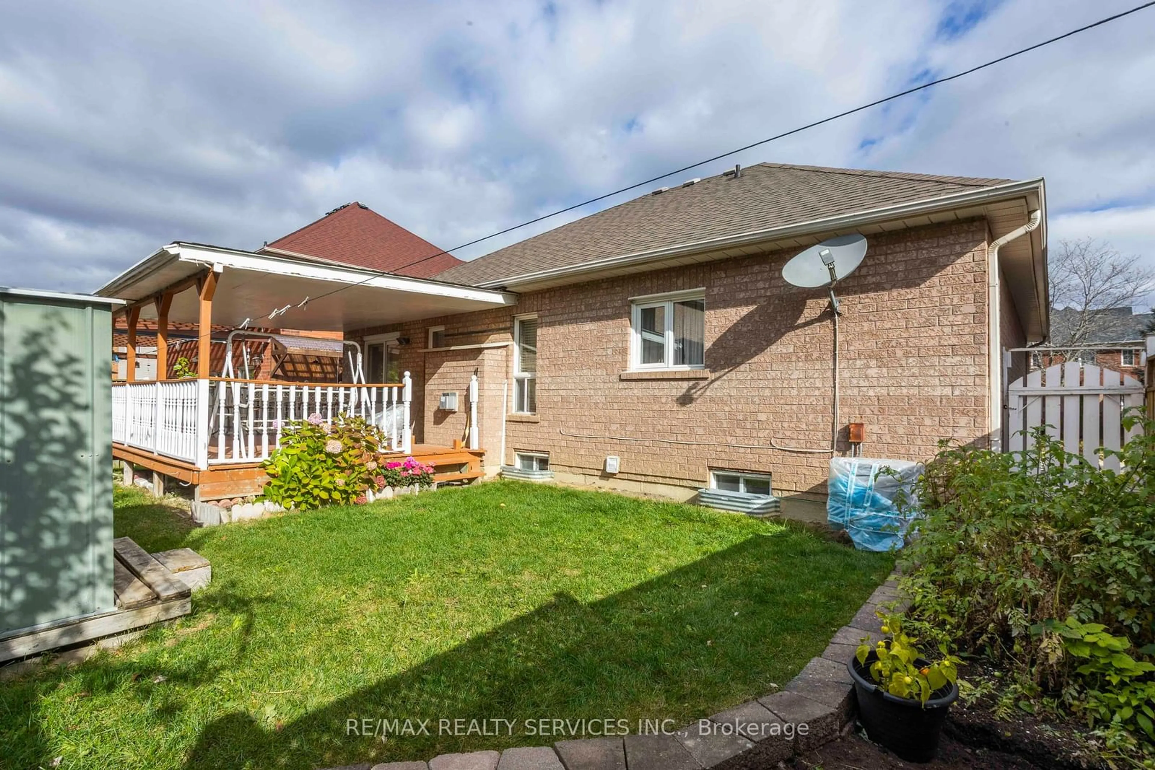 Frontside or backside of a home, the fenced backyard for 31 Silktop Tr, Brampton Ontario L6R 2K6