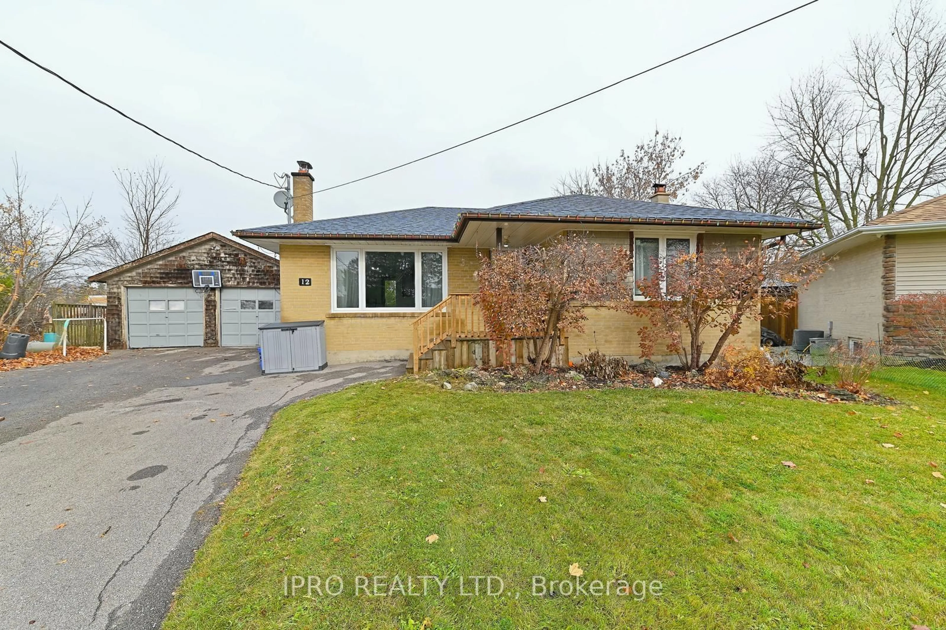 Frontside or backside of a home, the street view for 12 Mackenzie Dr, Halton Hills Ontario L7G 4B9