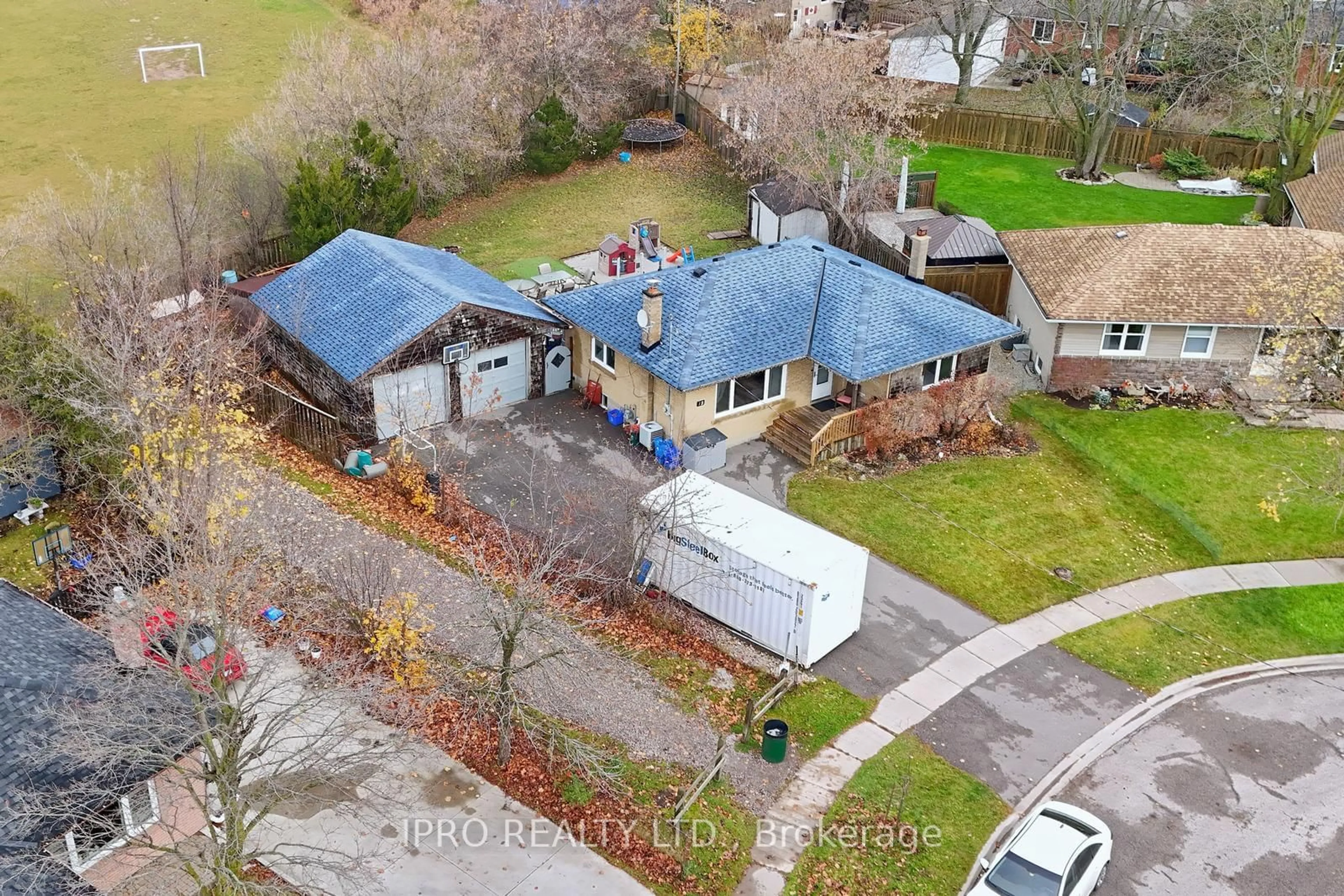 Frontside or backside of a home, the street view for 12 Mackenzie Dr, Halton Hills Ontario L7G 4B9